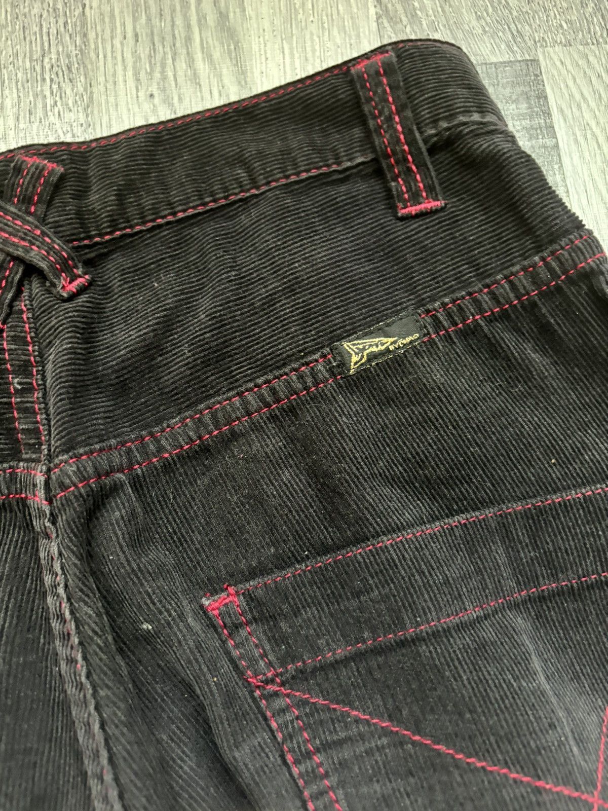 20471120 Hyoma 'Red Line' Black Corduroy Trousers Pants