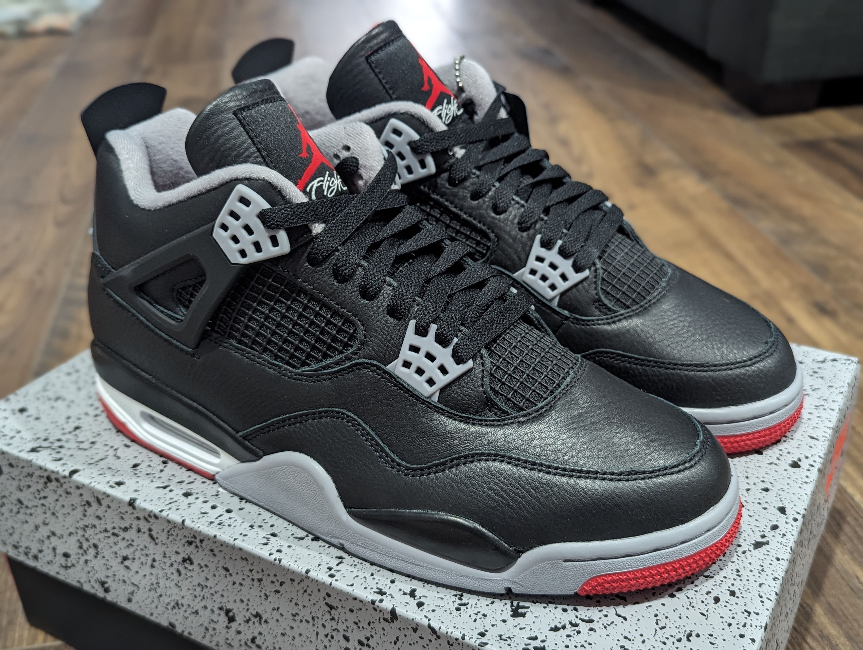 image of Jordan Nike Air Jordan 4 Retro Bred Reimagined Shoes in Black, Men's (Size 11)