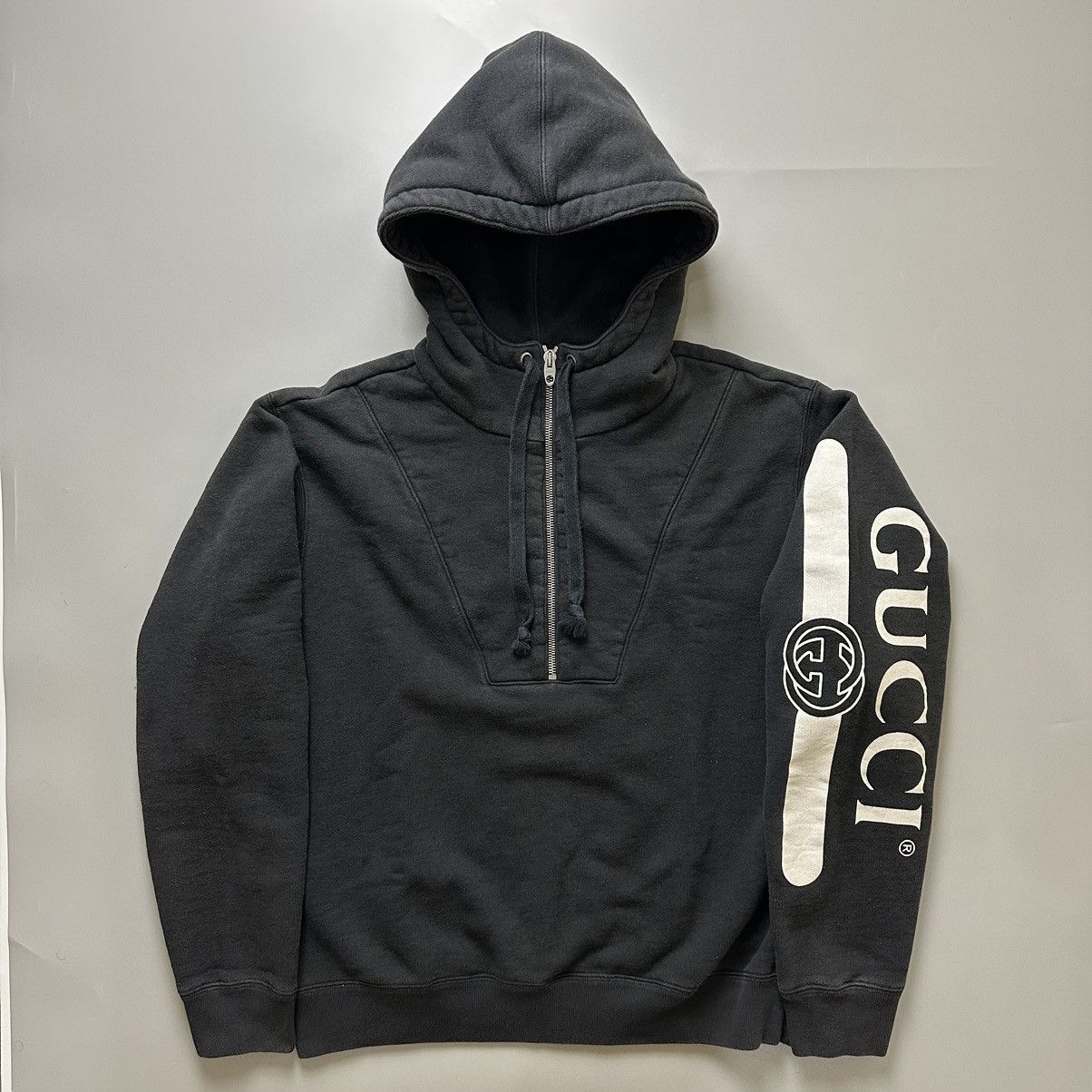 image of Gucci Half Zip Signature Logo in Black, Men's (Size XS)