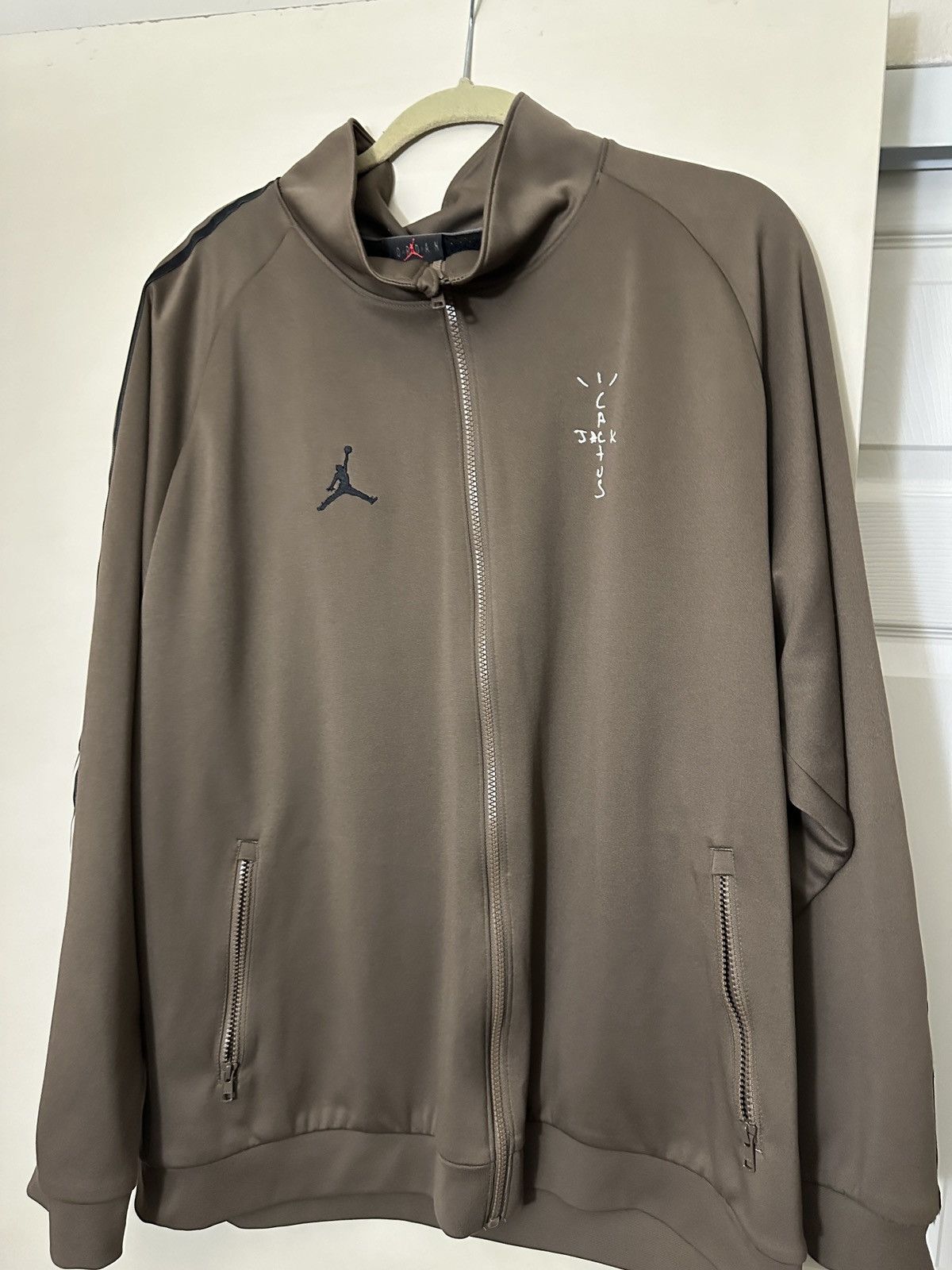 Jordan Brand × Travis Scott Travis Scott x Air Jordan MJ Track Jacket  'Palamino/Black' | Grailed