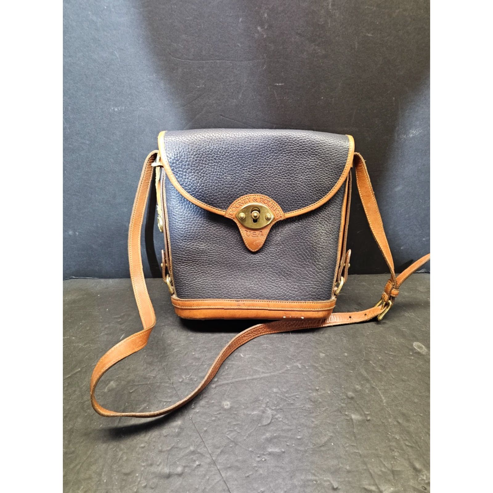 Dooney & Bourke VINTAGE Dooney & Bourke All Weather Leather Pebbled Finish Spectator Bag Navy Blue Bucket Bag Women Medium Brown Leather Strap 11" Gold Hardware Size ONE SIZE - 2 Thumbnail