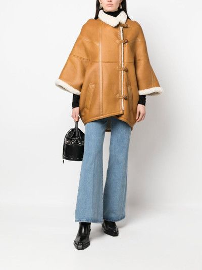 Saint Laurent Paris o1tp1o1224 Cape In Leather With Shearling in Bourbon Ecru Size L / US 10 / IT 46 - 1 Thumbnail