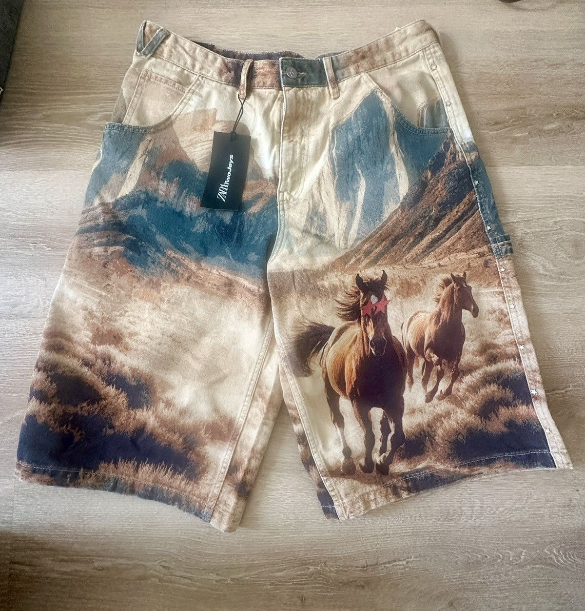 Horse print denim shorts