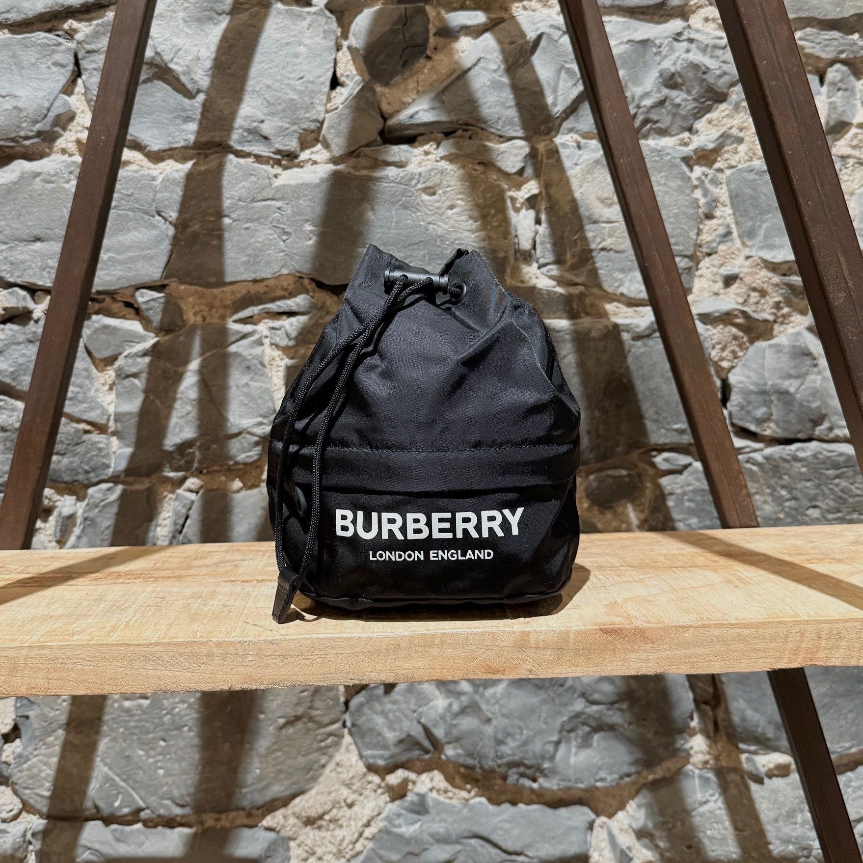 Burberry Burberry Black Nylon Phoebe Drawstring Mini Bucket Pouch Size ONE SIZE - 1 Thumbnail