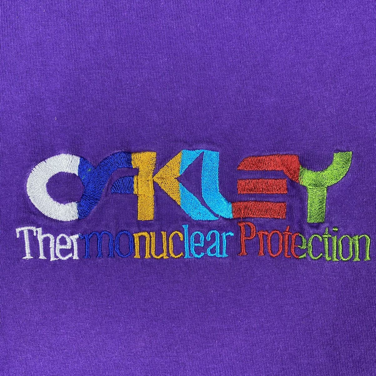 Oakley × Vintage VINTAGE 90's OAKLEY THERMONUCLEAR PROTECTION EMBROIDERY TEE Size US L / EU 52-54 / 3 - 4 Thumbnail