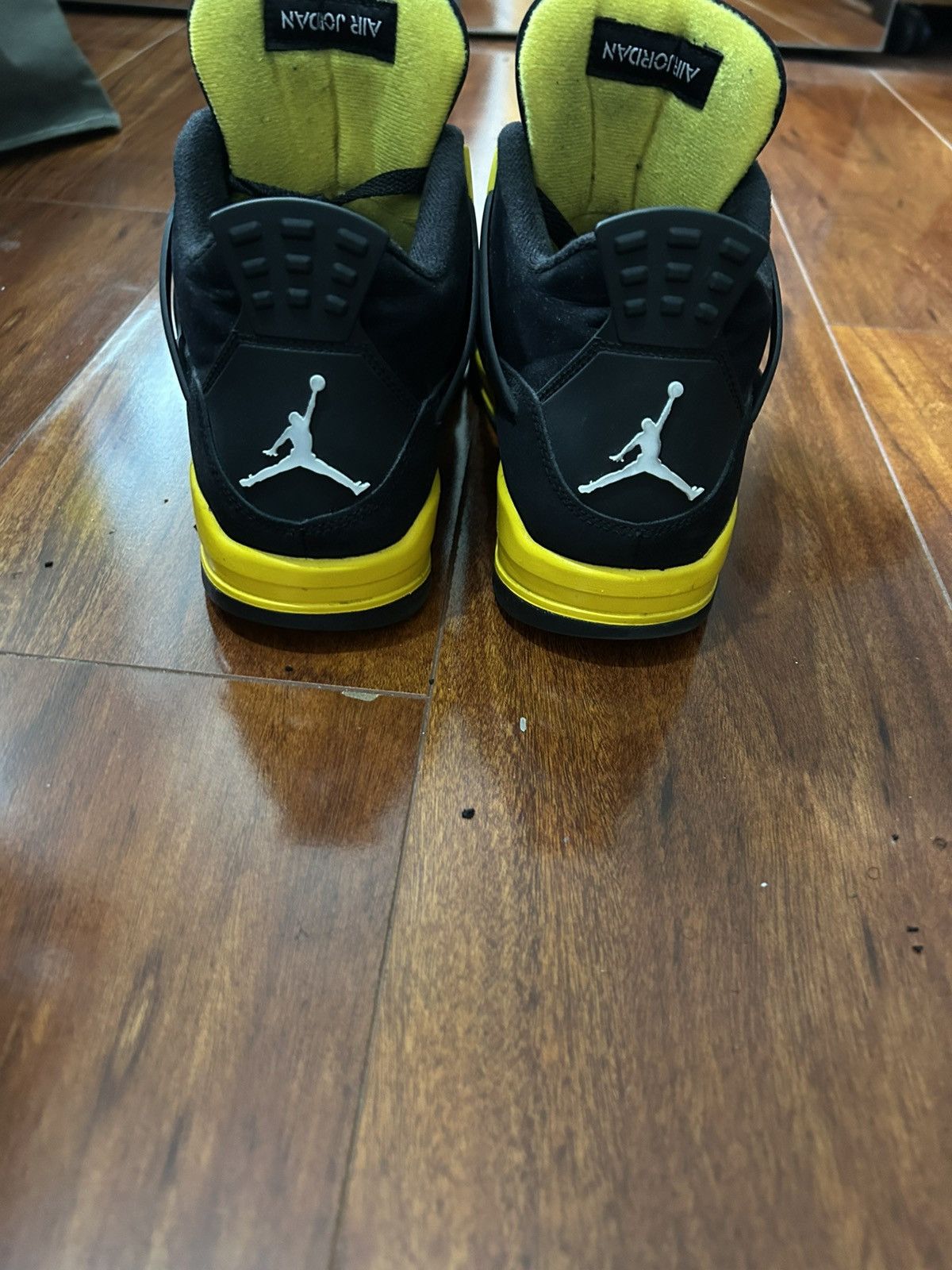 Nike Jordan 4 Retros black and yellow Size US 9 / EU 42 - 5 Thumbnail