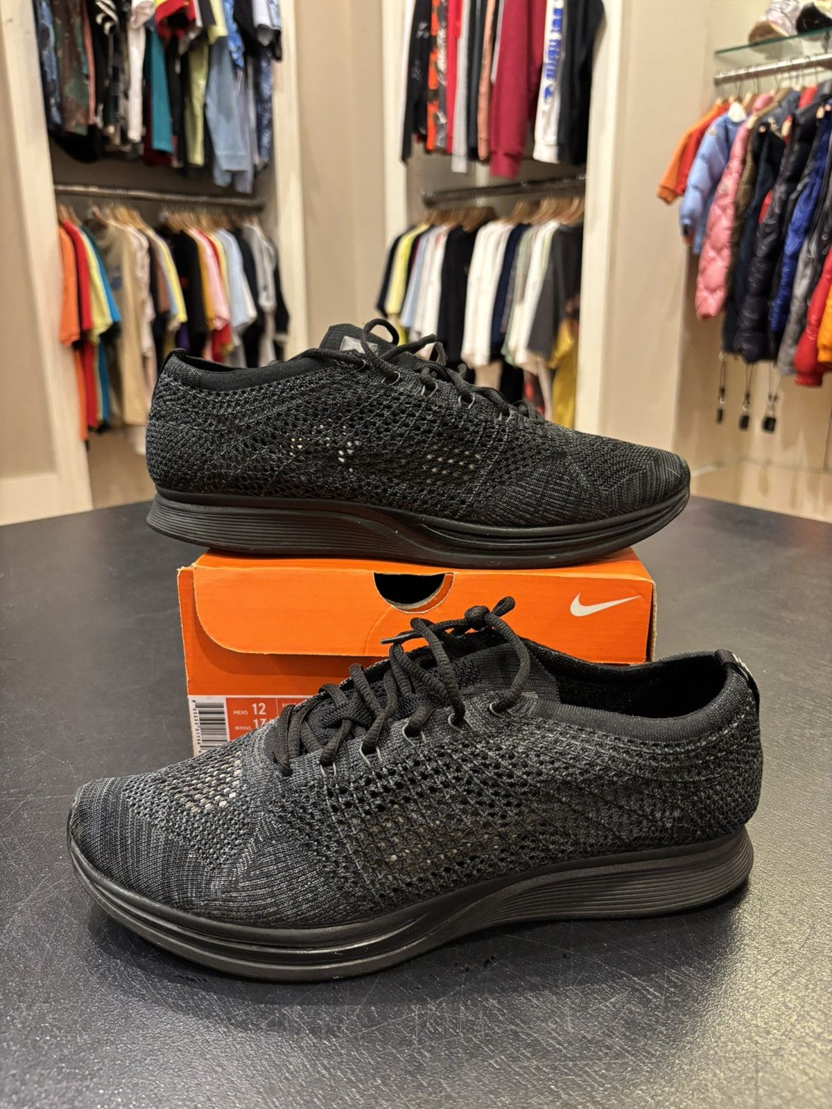 Nike Nike Flyknit Racer Triple Black Size US 12 / EU 45 - 1 Thumbnail