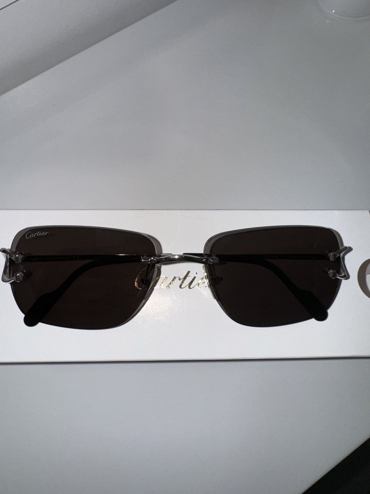 image of Cartier Men’S Rimless Metal Sunglasses in Silver, Men's