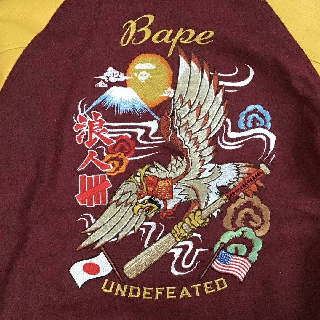 Bape × Undefeated 2012 Undefeated × BAPE leather varsity jacket a bathing ape Size US L / EU 52-54 / 3 - 5 Thumbnail