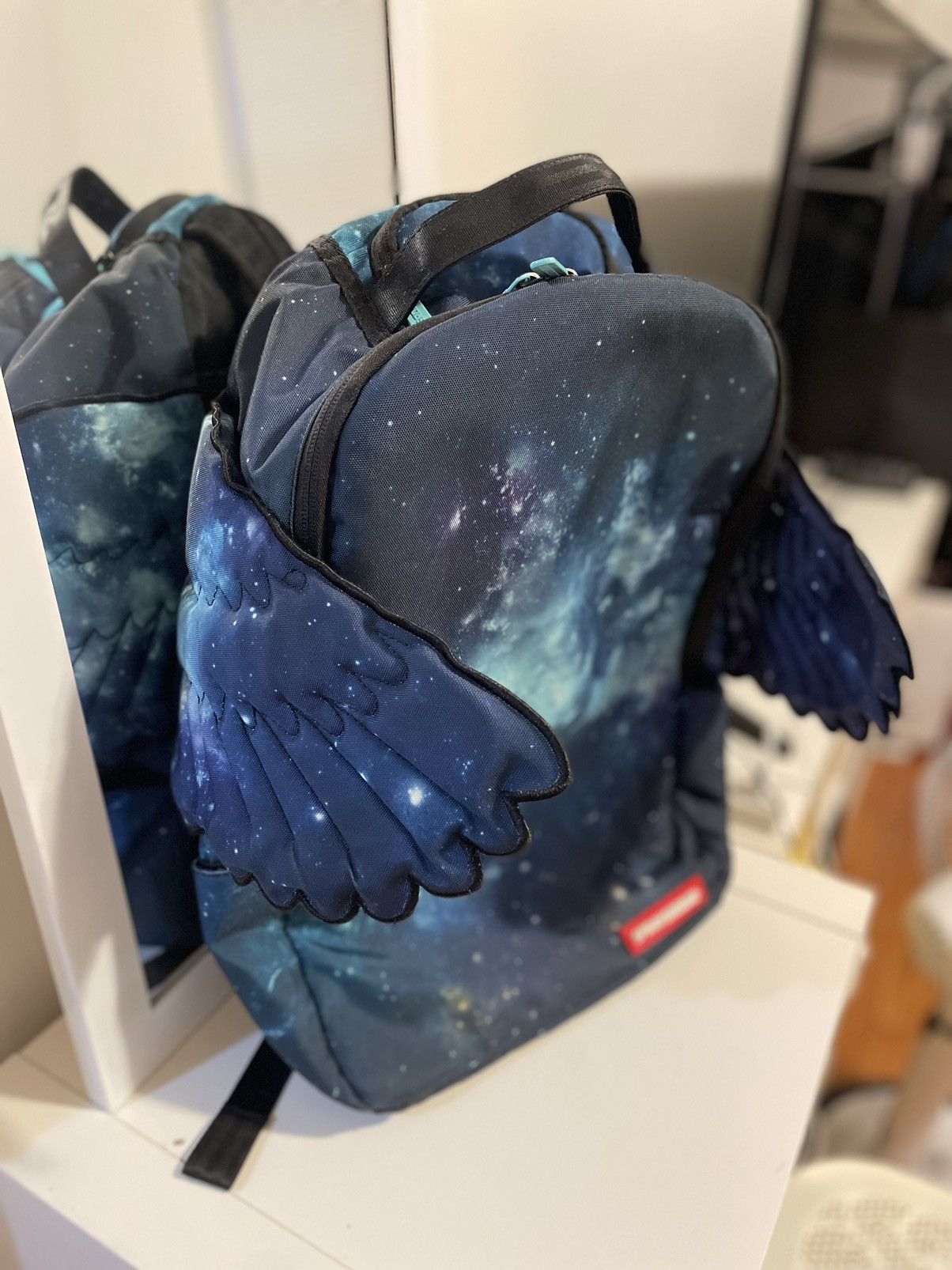 Sprayground galaxy hotsell wings backpack