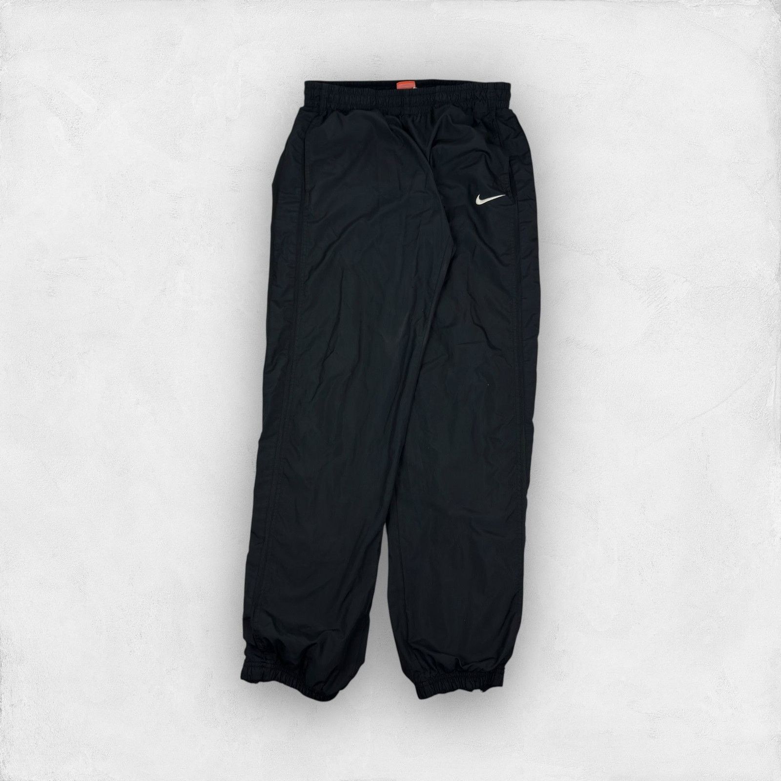 Japanese Brand × Nike Nike The Athletic Dept Men's Black Swoosh Straight Pants M Size US 30 / EU 46 - 1 Thumbnail