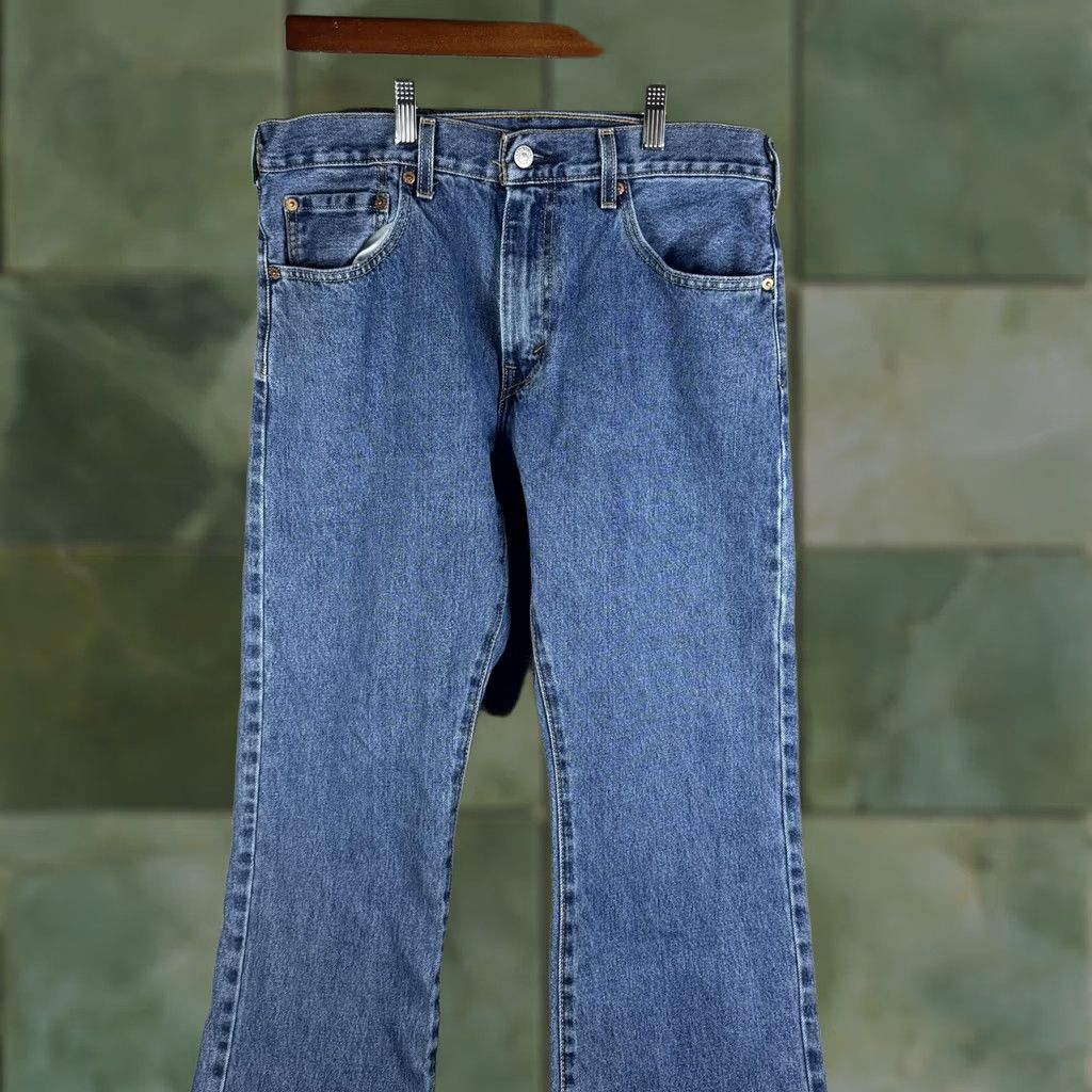 Levi's Levi's 517 Jeans Mens 33x29 Blue Bootcut Regular Denim Mexico Medium Wash Distressed Pockets Zip Back Patch Red Tab 500 Series Mens Jeans Regular Fit Size US 33 - 1 Thumbnail