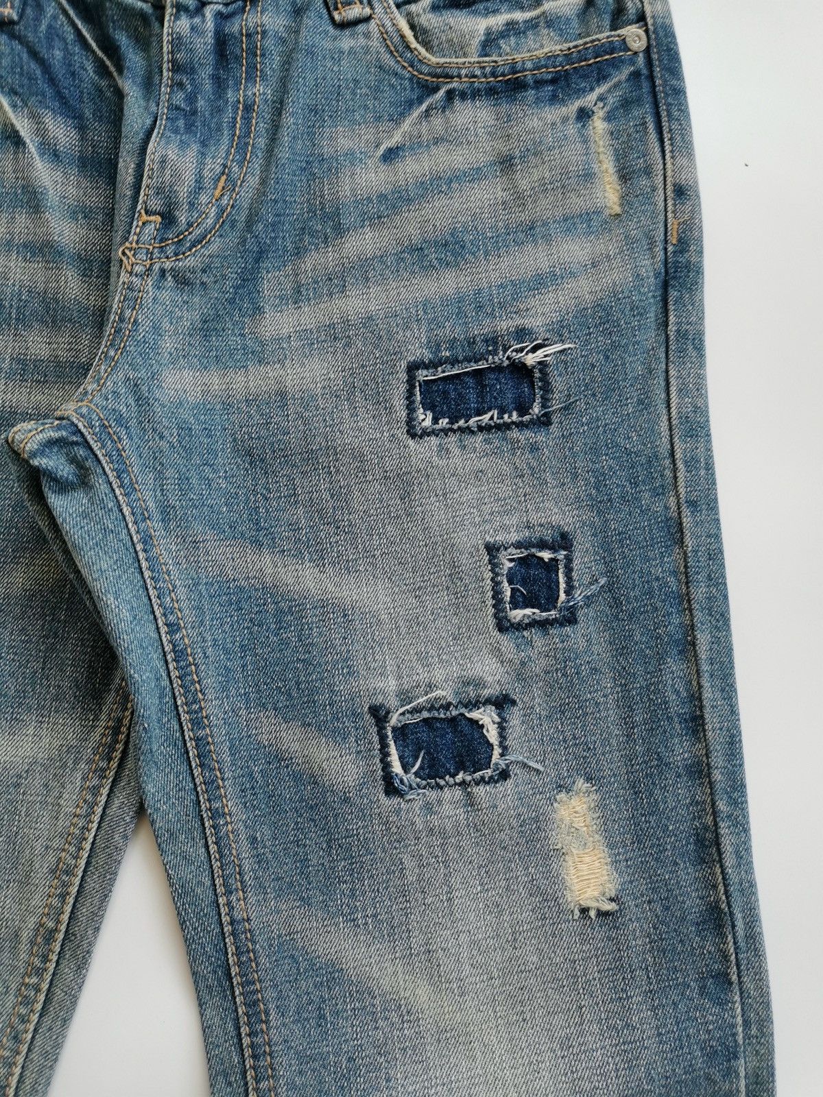 Tornado Mart Deadly Jester Bootcut Patchwork Distressed Jeans | Grailed