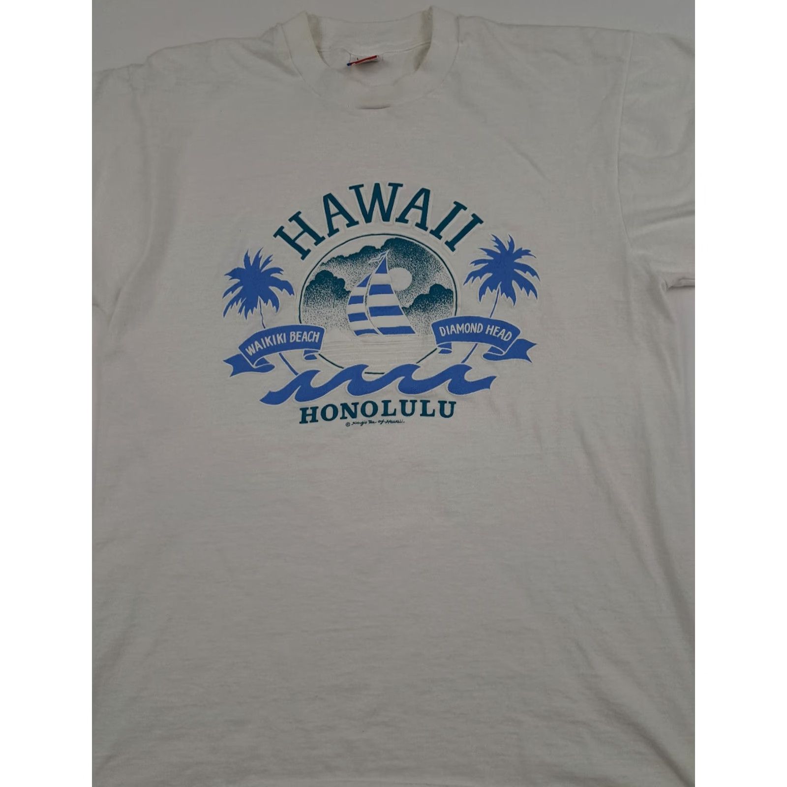 Fruit Of The Loom VINTAGE Hawaii Waikiki Beach T-Shirt USA LG Hilton Head Fruit of the Loom Crew Neck Short Sleeve Men 1980s White Sky Blue Size US L / EU 52-54 / 3 - 2 Thumbnail