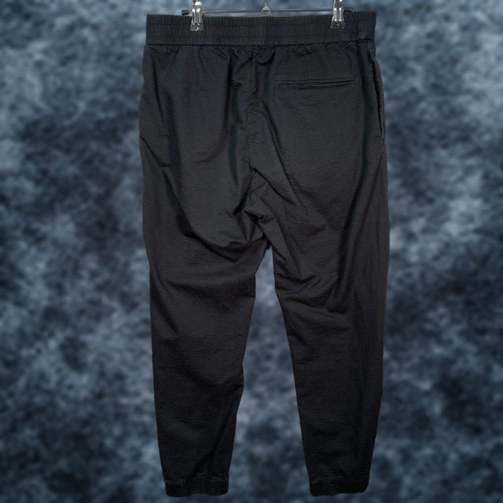 Cos COS Men's 32 Black Textured Cotton Tapered Leg Chino Pants Elastic Waist - Flat Front, Mid Rise, 27in Inseam, Casual, Regular, Pocket - Mens Pants Size US 32 / EU 48 - 1 Thumbnail