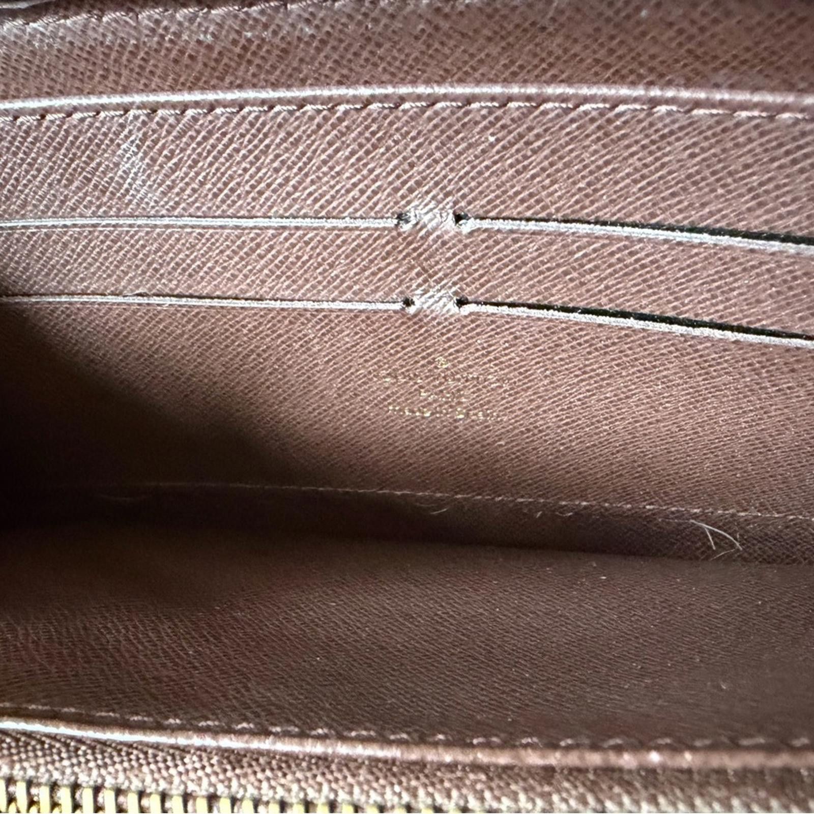Louis Vuitton Louis Vuitton Monogram Denim Zippy Wallet in Brown and Tan Size ONE SIZE - 6 Thumbnail