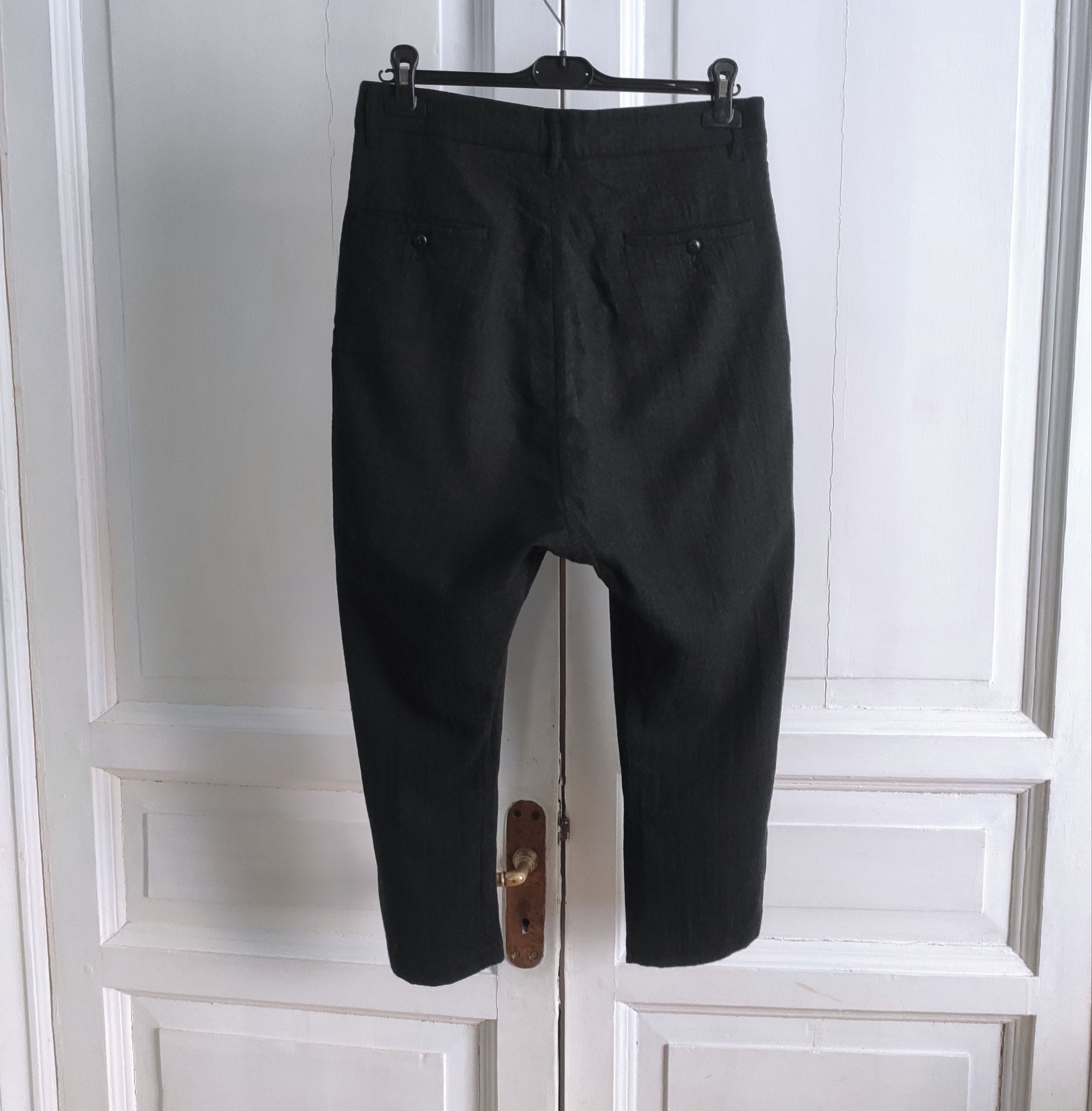 Wool drop crotch trousers.Like Layer-0 or Deepti
