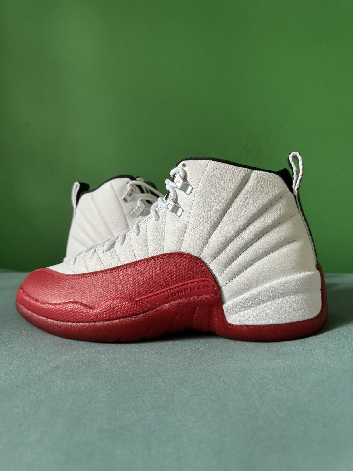 image of Nike Air Jordan 12 Cherry 2023 Shoes in Red, Men's (Size 10.5)