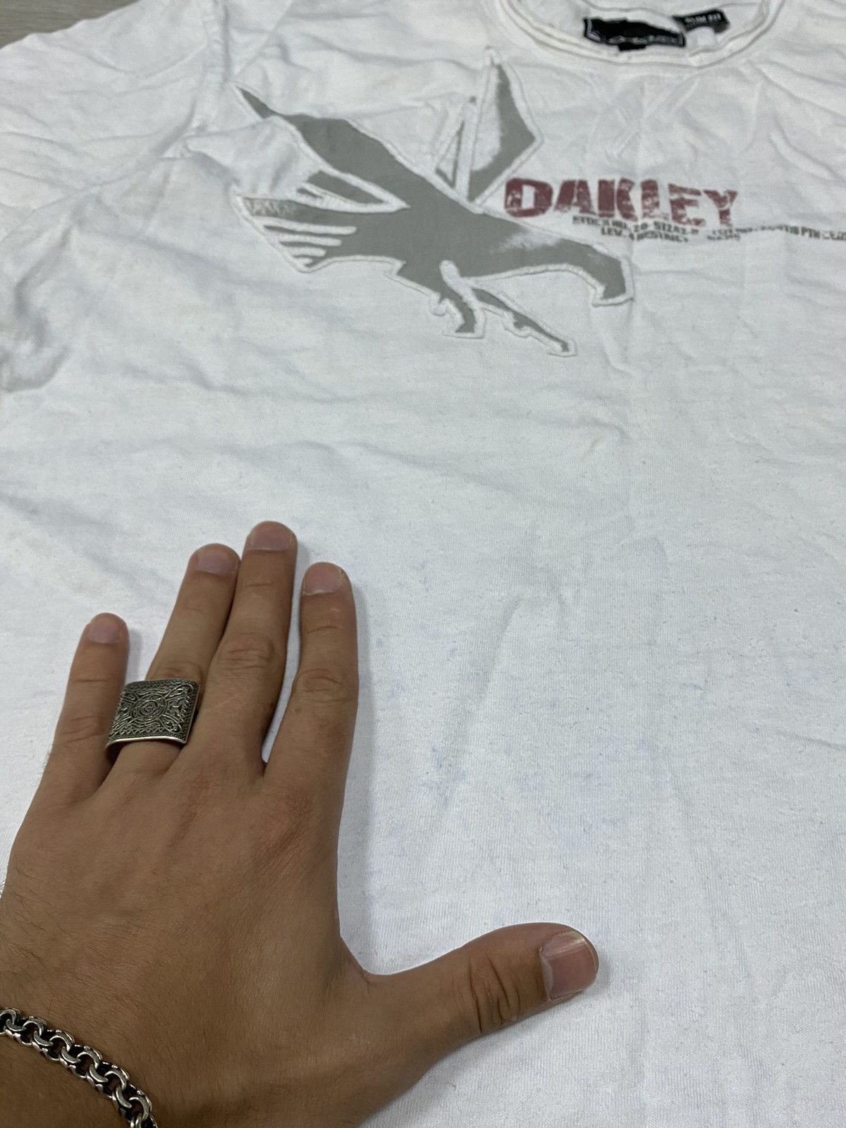 Oakley Oakley eagle 🦅 RARE vintage circle big logo center Size US L / EU 52-54 / 3 - 6 Thumbnail