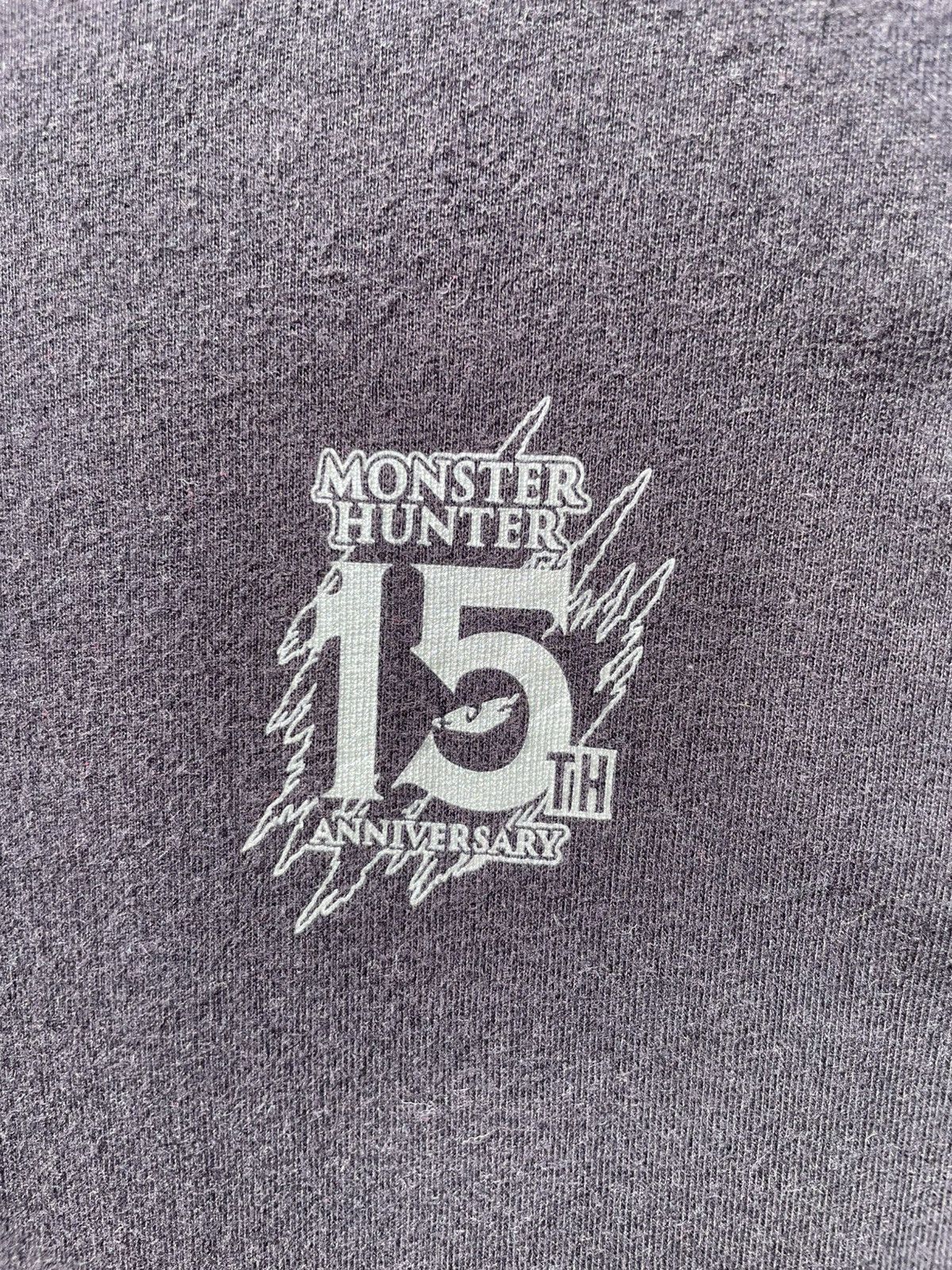 Uniqlo RARE🔥 Capcom Dragon Monster Hunter Size US L / EU 52-54 / 3 - 4 Thumbnail