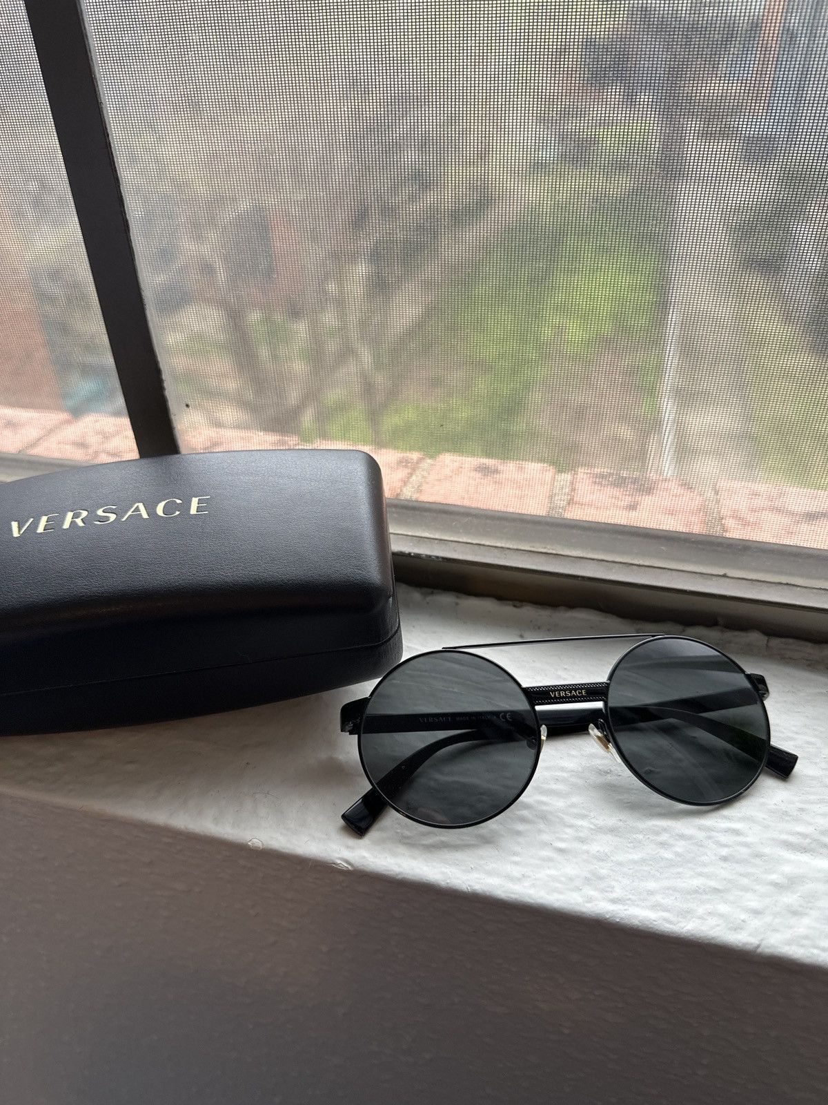 image of Versace Round Sunglasses in Black, Men's