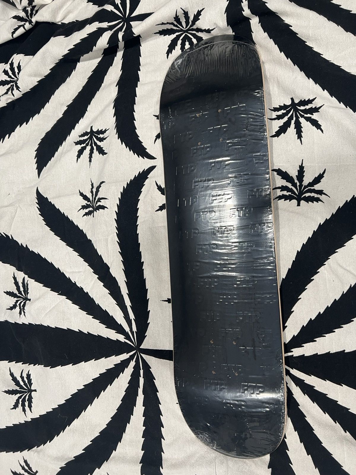 Fuck The Population FTP Debossed All Over Skate Deck (Black) size 8 Size ONE SIZE - 1 Thumbnail