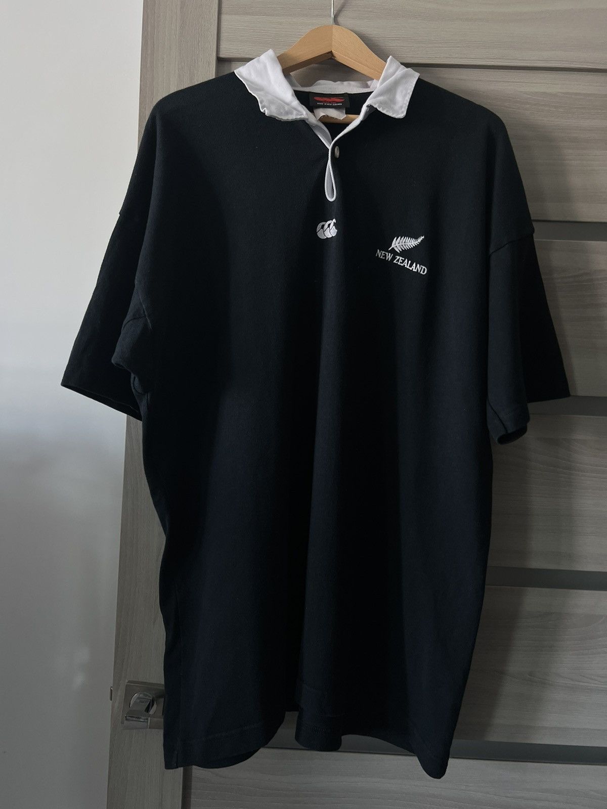 💥90s ALL BLACK POLO RUGBY VINTAGE CANTERBURY TEE RARE