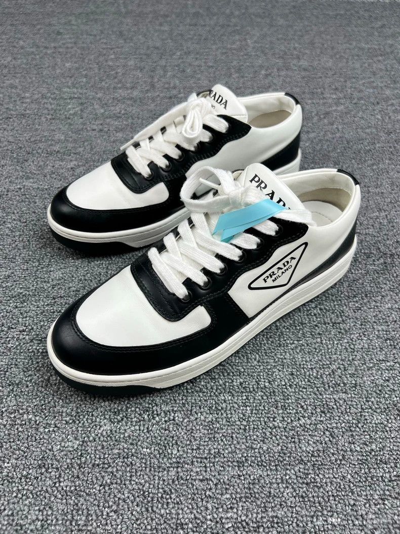 Prada Black and White Triangle Logo Low-Top Sneakers