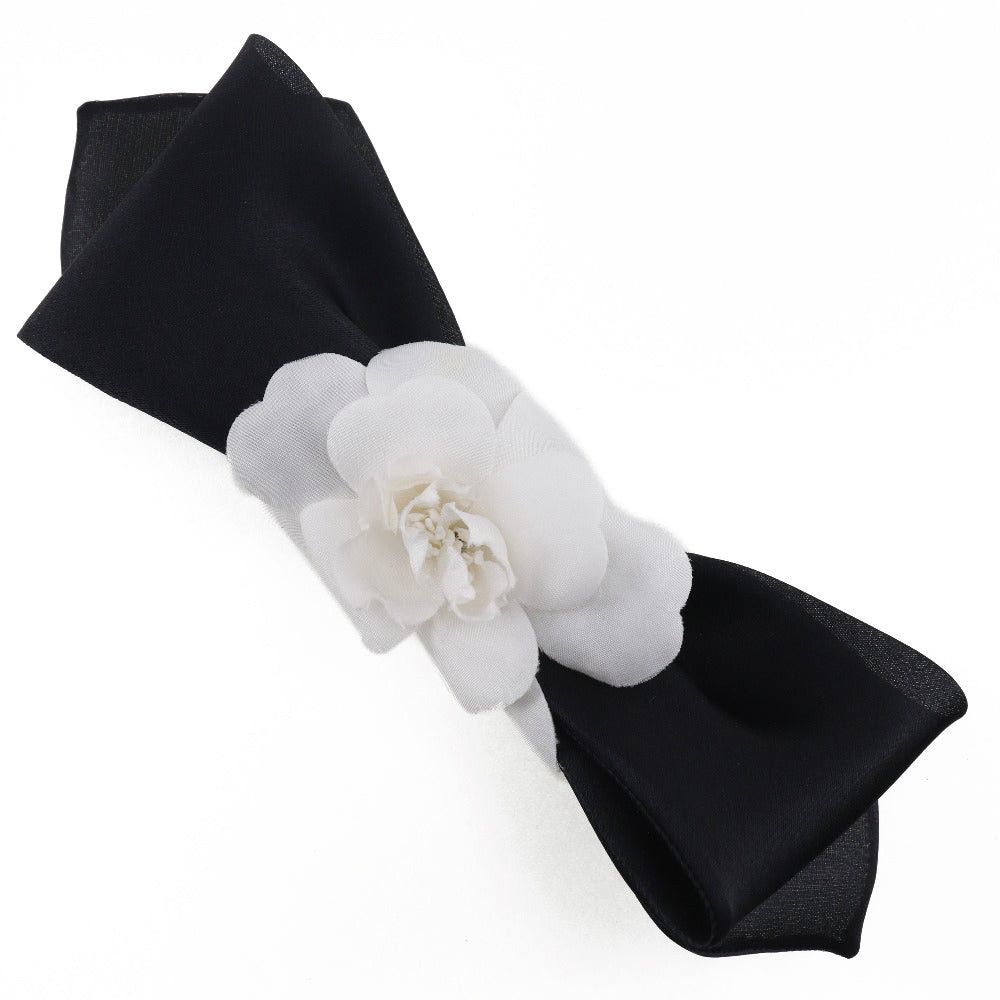 image of Chanel Camellia Hair in Black, Women's
