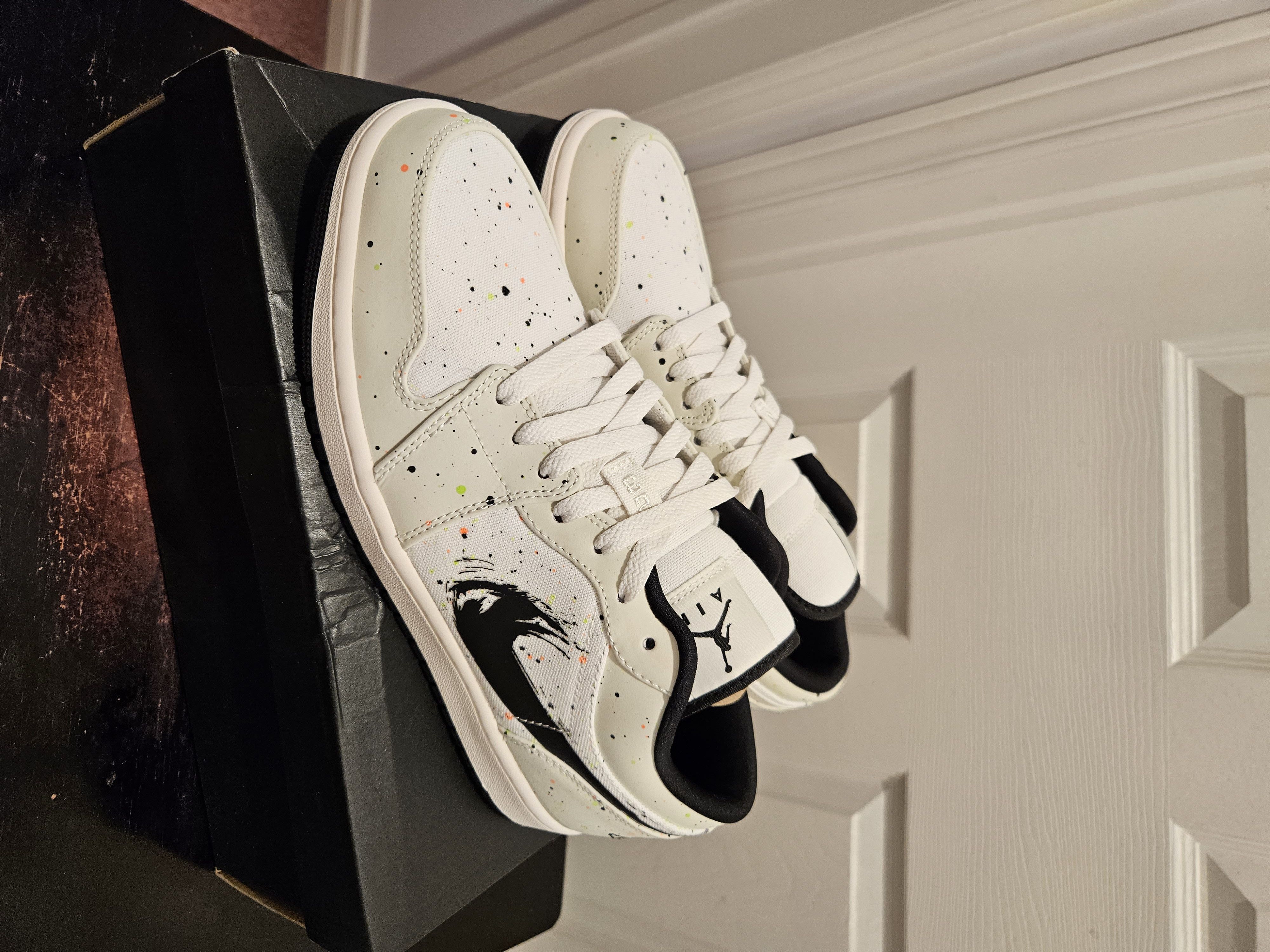 image of Air Jordan 1 Low Brushstroke Shoes in Black, Men's (Size 9)