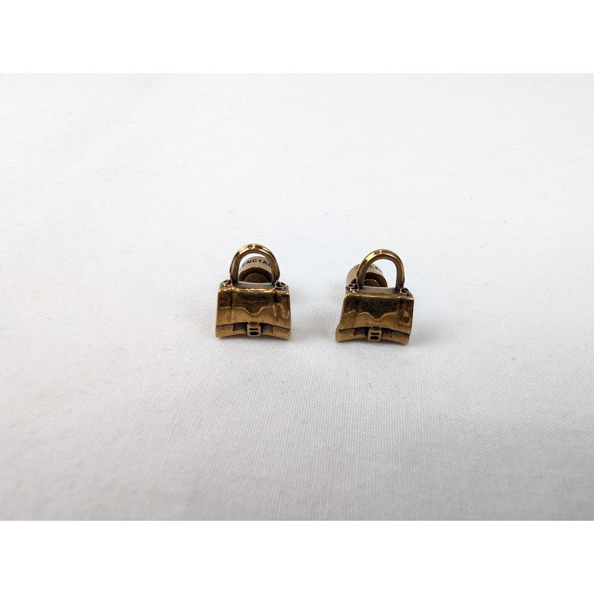 Balenciaga o1rshd1 Size: OS / Bronze Brass Hourgl Stud in Gold Size ONE SIZE - 1 Thumbnail
