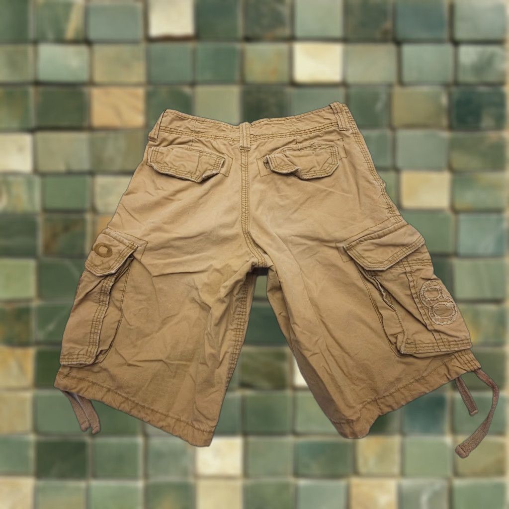 Vintage Aéropostale Cargo Shorts Mens 28 Heavy Cotton Paratrooper Brown Tan 2000s Pattern Solid Pockets Cargo Pocket Rise Mid 12in Inseam 12in Size US 28 / EU 44 - 1 Thumbnail