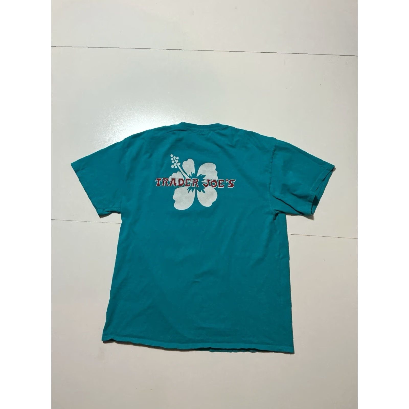 Port & Company VINTAGE Trader Joes Grocery Store Hibiscus Flower Graphic Teal S/S Employee Team Member T-Shirt Sz.L Size US L / EU 52-54 / 3 - 3 Thumbnail