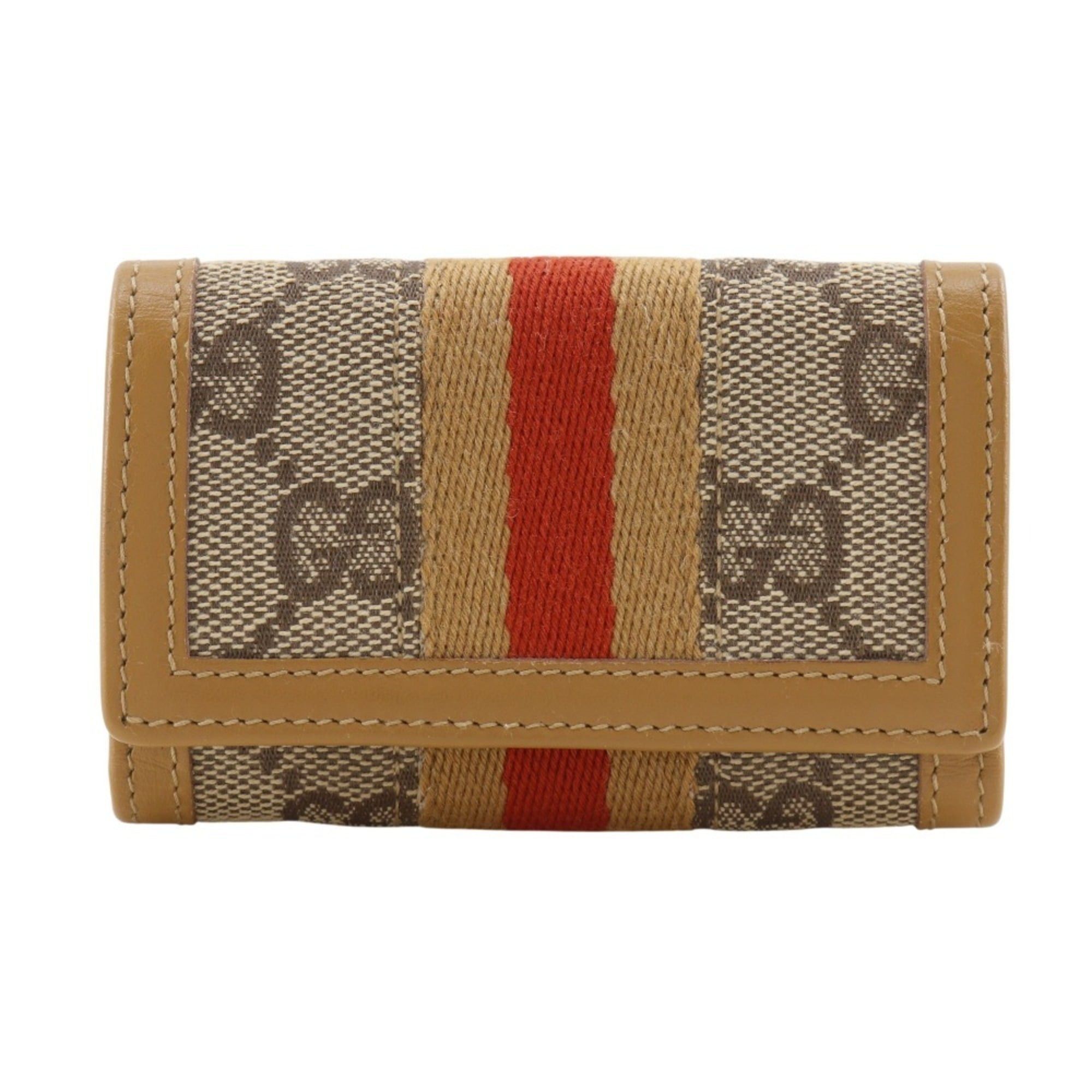Gucci Gucci key case, model number 033.0416.0881, GG canvas, ochre color, snap button closure, unisex. Size ONE SIZE - 1 Thumbnail