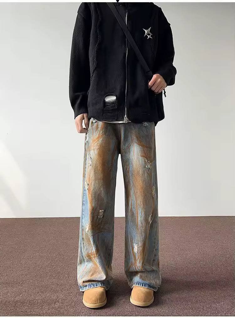 ripped casual jeans in a rust color.