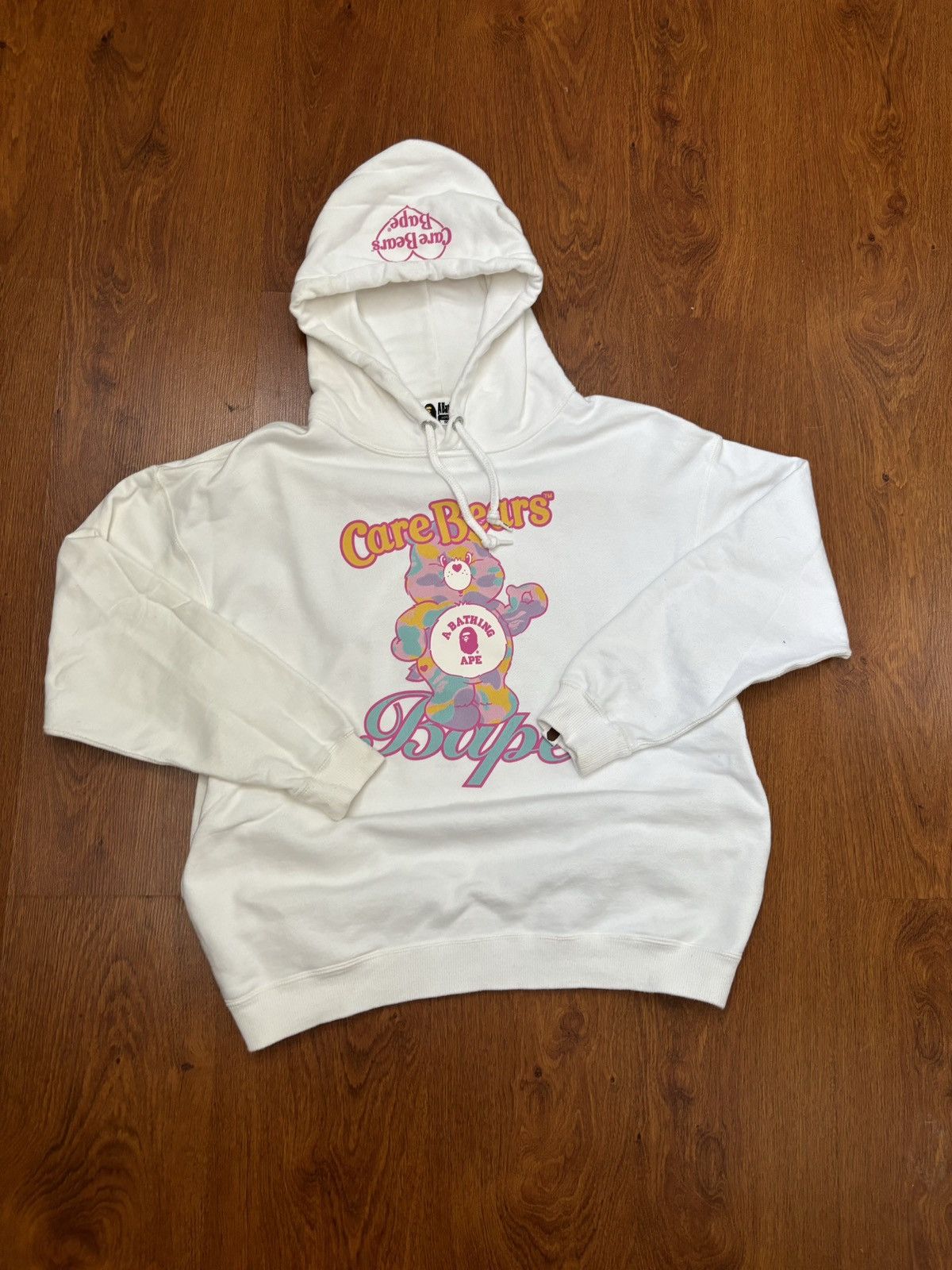 image of Bape X Care Bears Pullover Hoodie in White, Women's