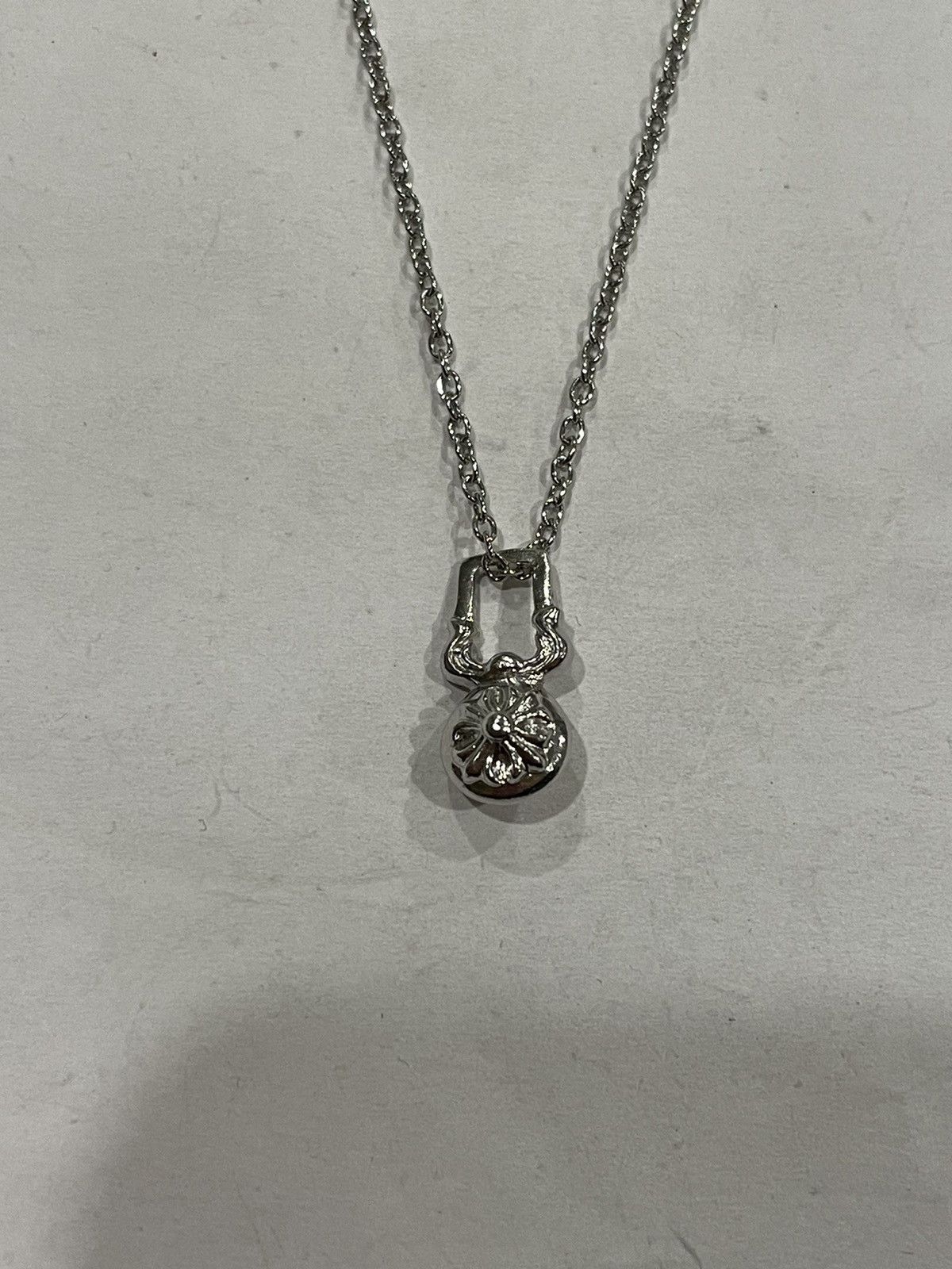 image of Chrome Hearts Rhodium Cross Ball Zipperpendant in Silver, Men's