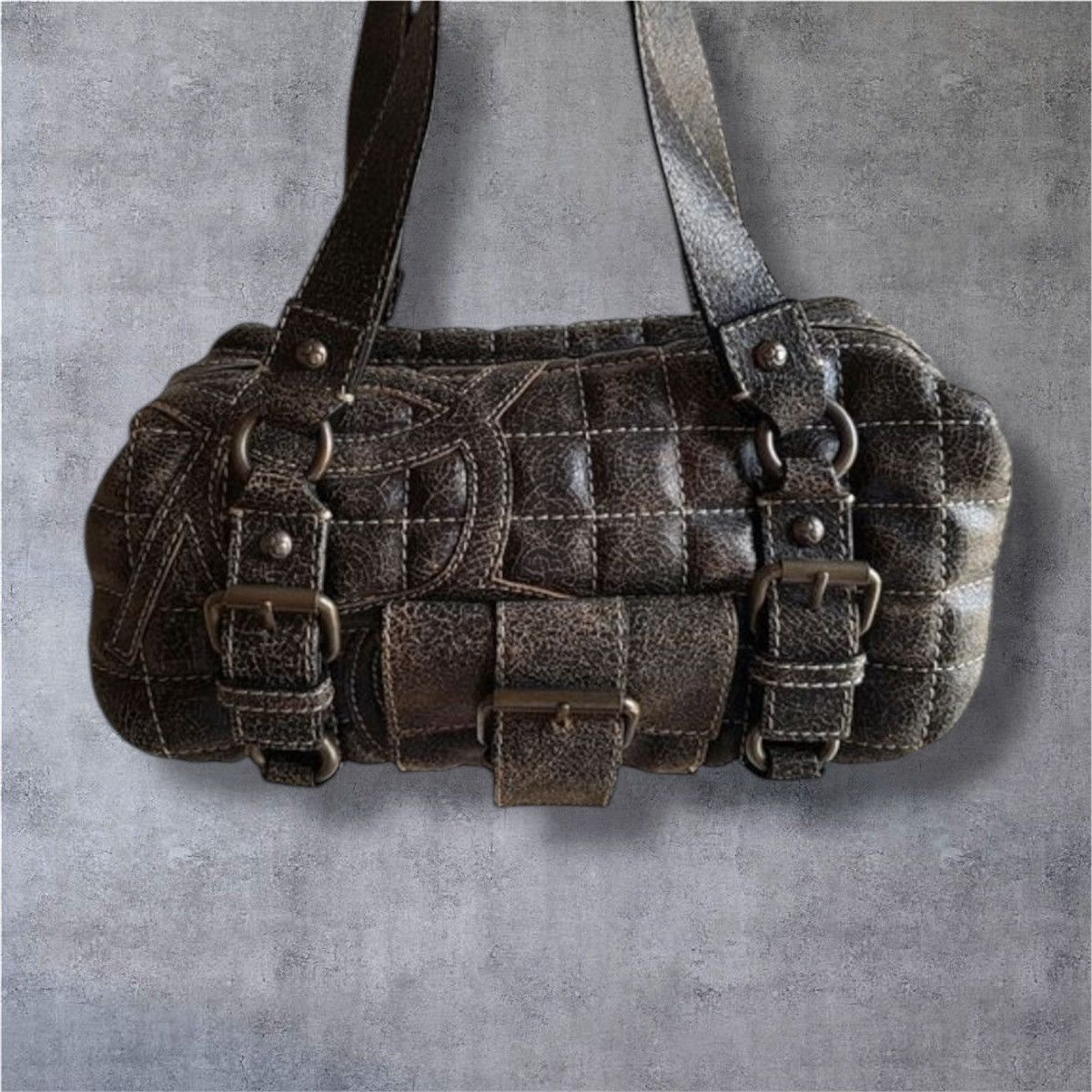 Avant garde grey leather bag