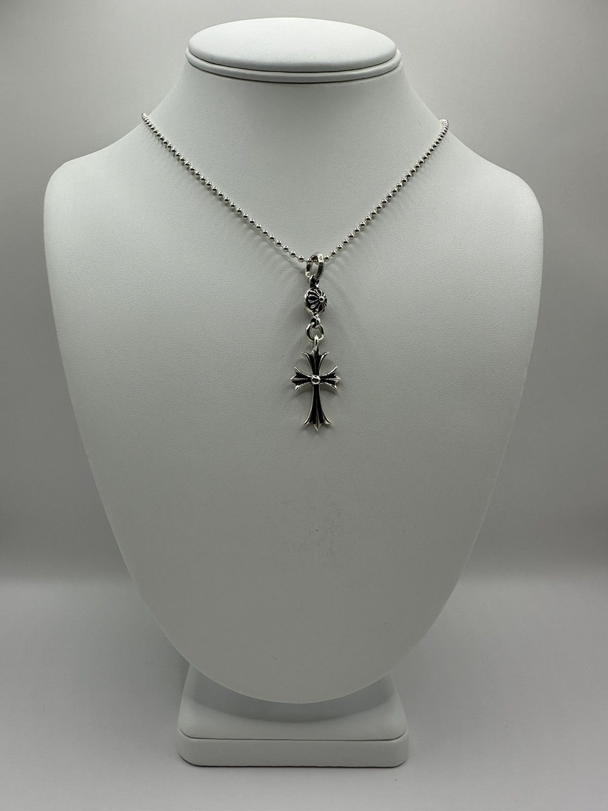 image of Chrome Hearts One Ball Tiny Cross in Silver, Men's