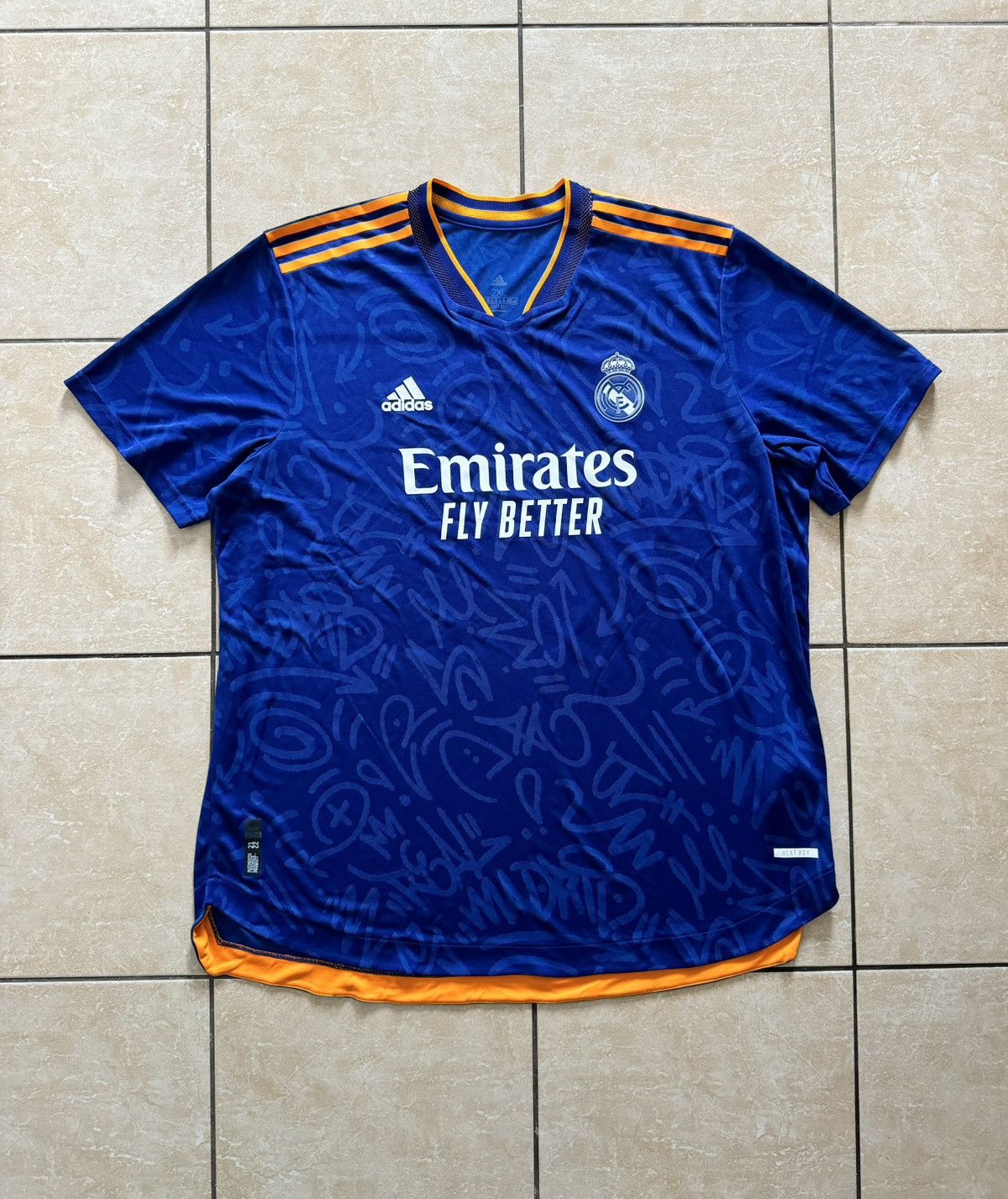 image of Adidas Real Madrid 2021-22 Away Authentic Soccer Jersey in Blue/Orange, Men's (Size 2XL)