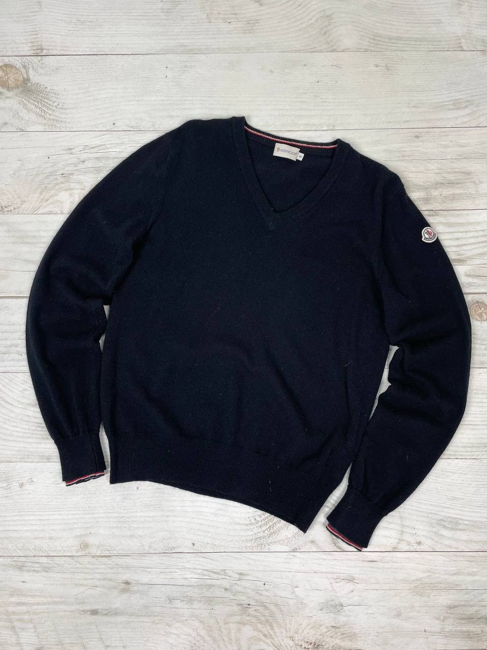 image of Moncler Maglione Tricot Scollo A V Navy V-Neck Wool Sweater in Black, Men's (Size Small)