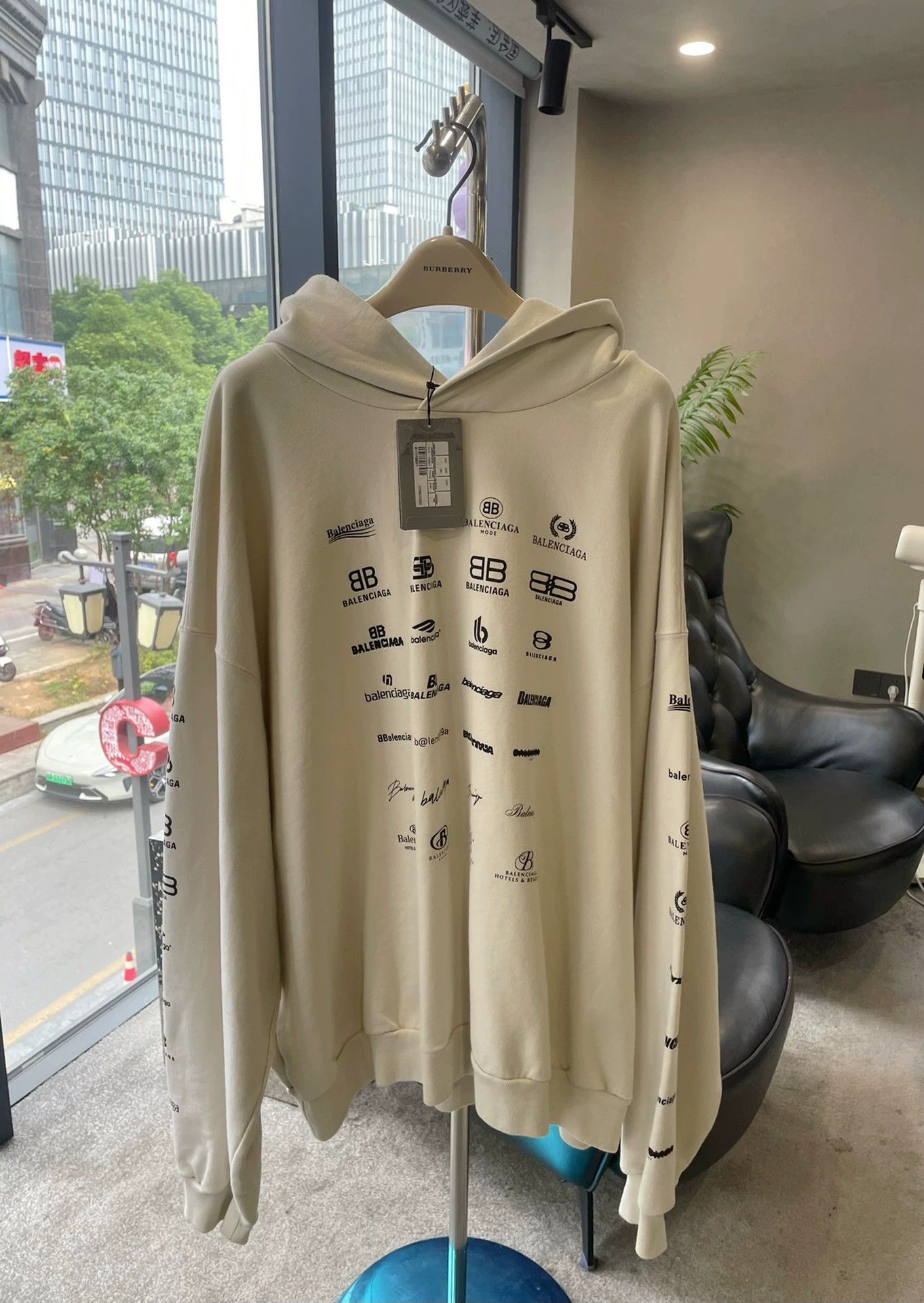 balenciaga all-over print hoodie in beige
