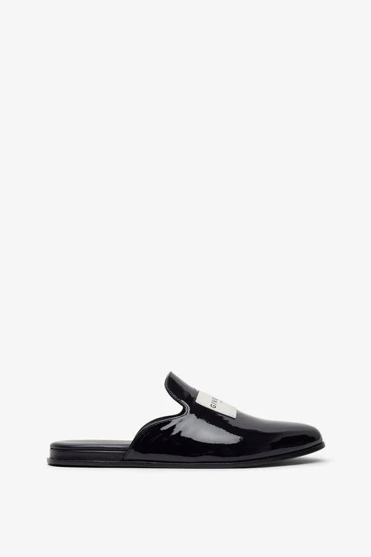 os11x1225 Label Flat Mules in Black