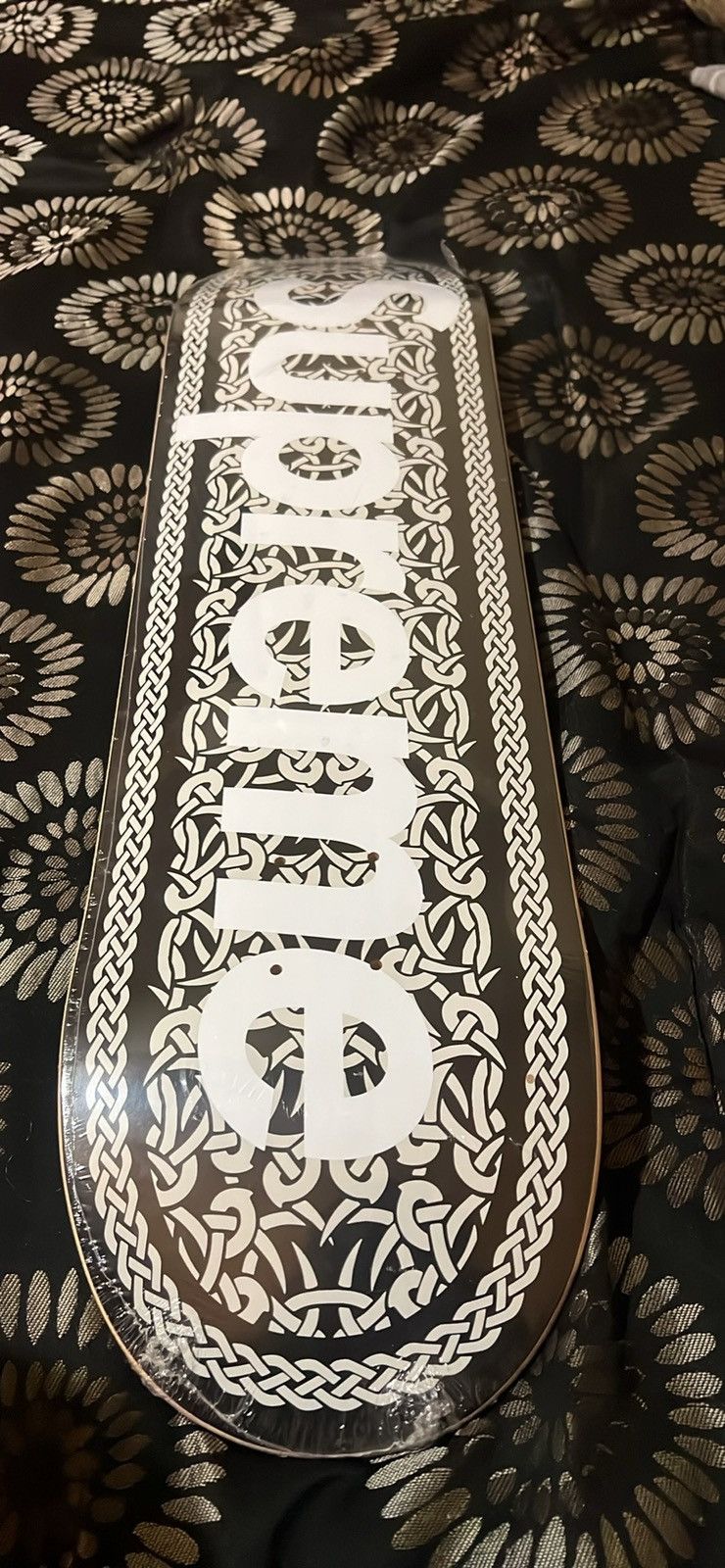 Supreme Celtic knot skateboard
