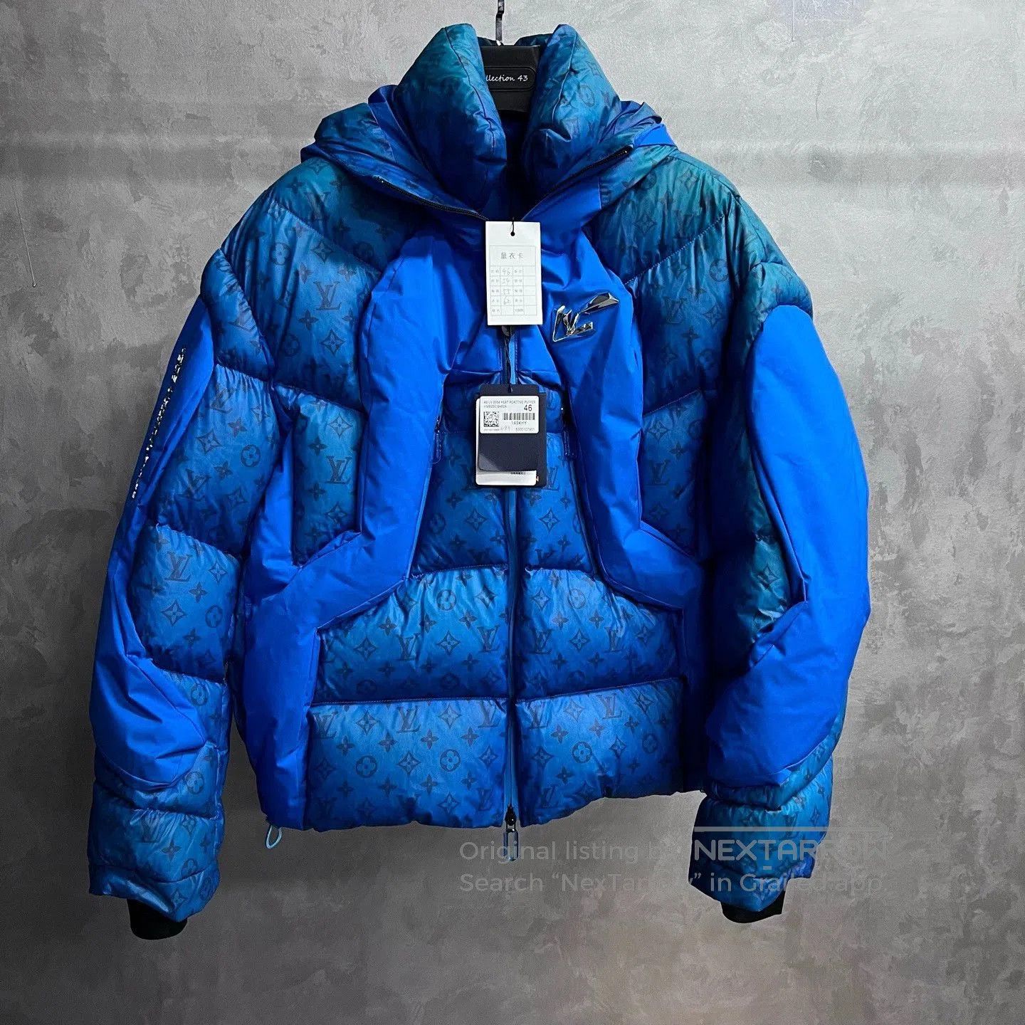 blue logo printed hooded puffer jacket.