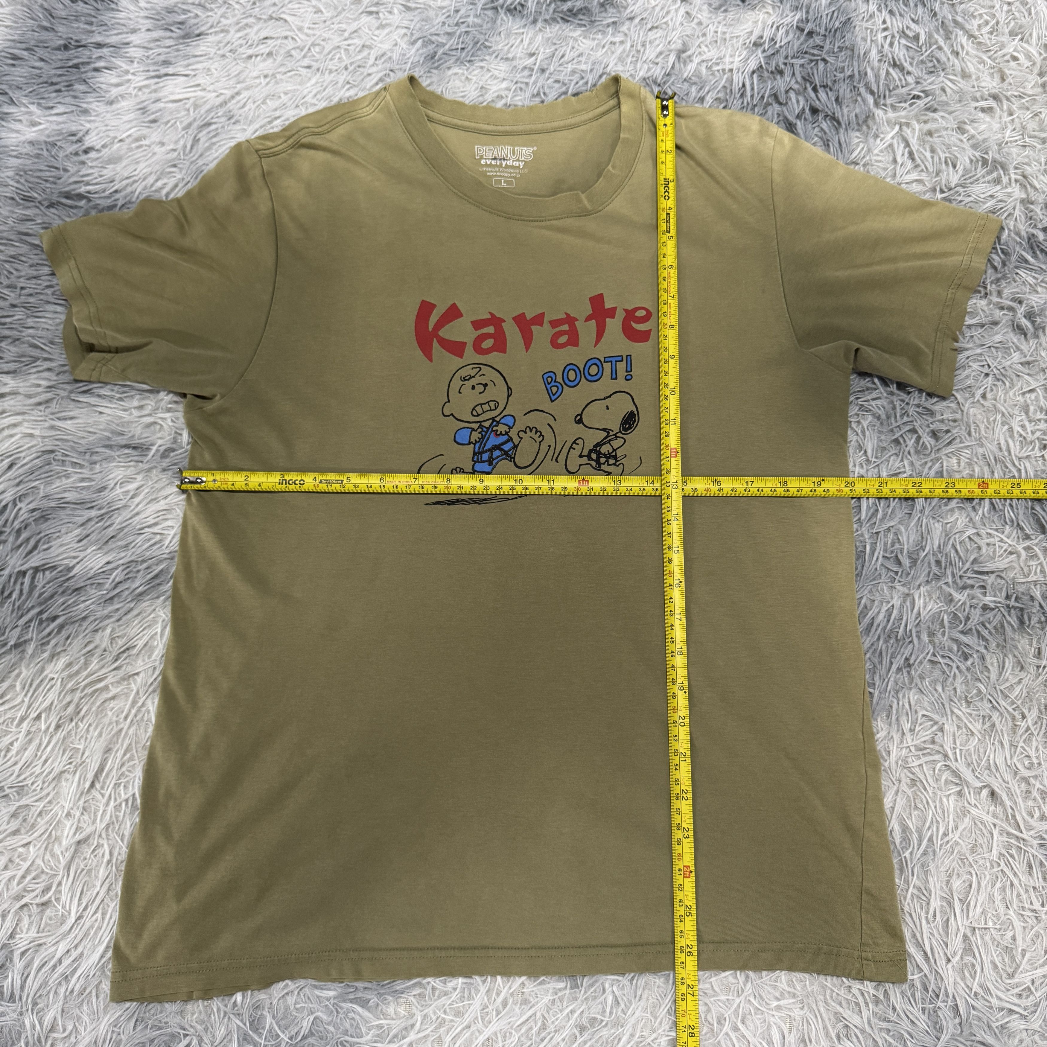 Kaws × Peanuts × Uniqlo UNIQLO Peanuts UT "Karate Boot!" Sunfaded Tshirt Size US L / EU 52-54 / 3 - 5 Thumbnail