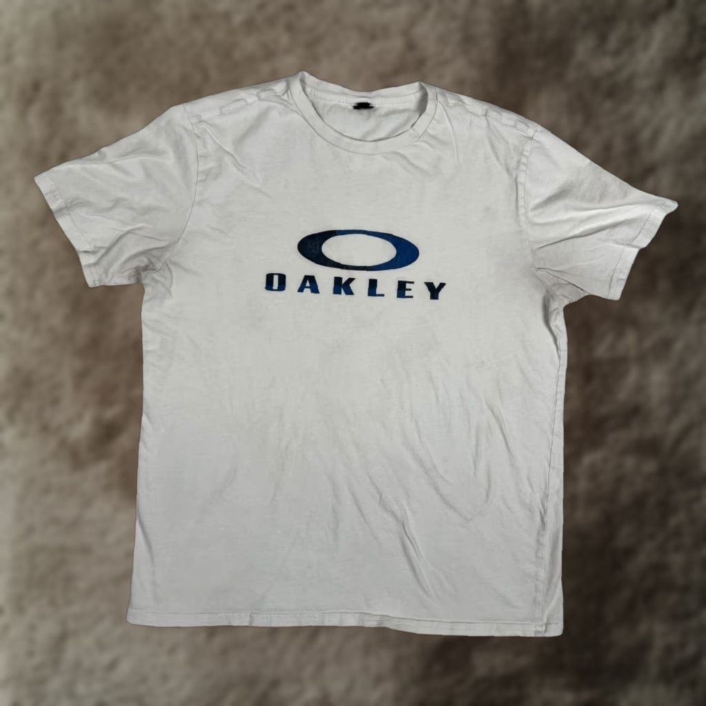 Oakley VTG Oakley T-Shirt Mens Large White Ellipse Logo Graphic Crew Neck Short Sleeve Casual Tee Mens L White Oakley Ellipse Logo Graphic 90s? Size US L / EU 52-54 / 3 - 1 Thumbnail