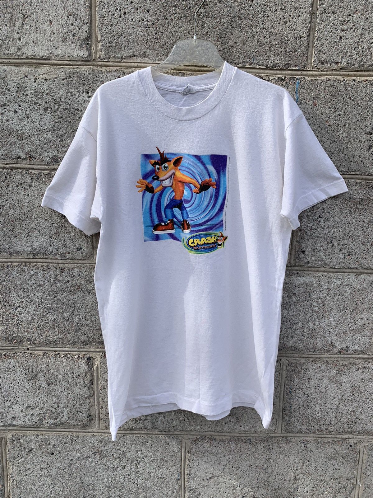 image of Playstation x Universal Studios Vintage Crash Bandicoot Official T-Shirt in White (Size Medium)