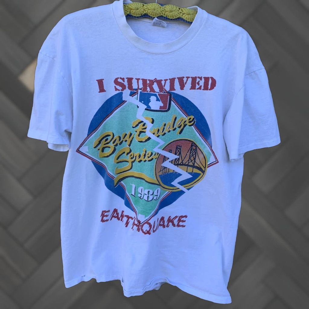 Vintage VINTAGE I Survived Bay Bridge Series 1989 Earthquake World Series t-shirt XL Shirt Men White 1989 Earthquake World Series A’s Giants Graphic Tee Size US XL / EU 56 / 4 - 1 Thumbnail