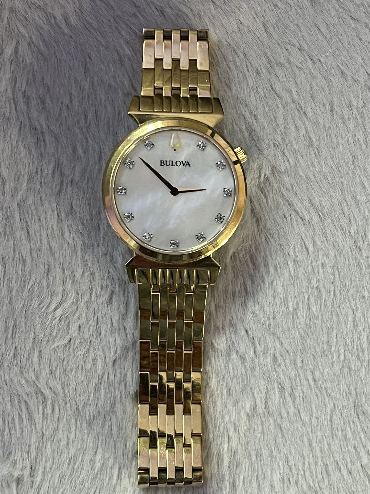 regatta bulova gold watch